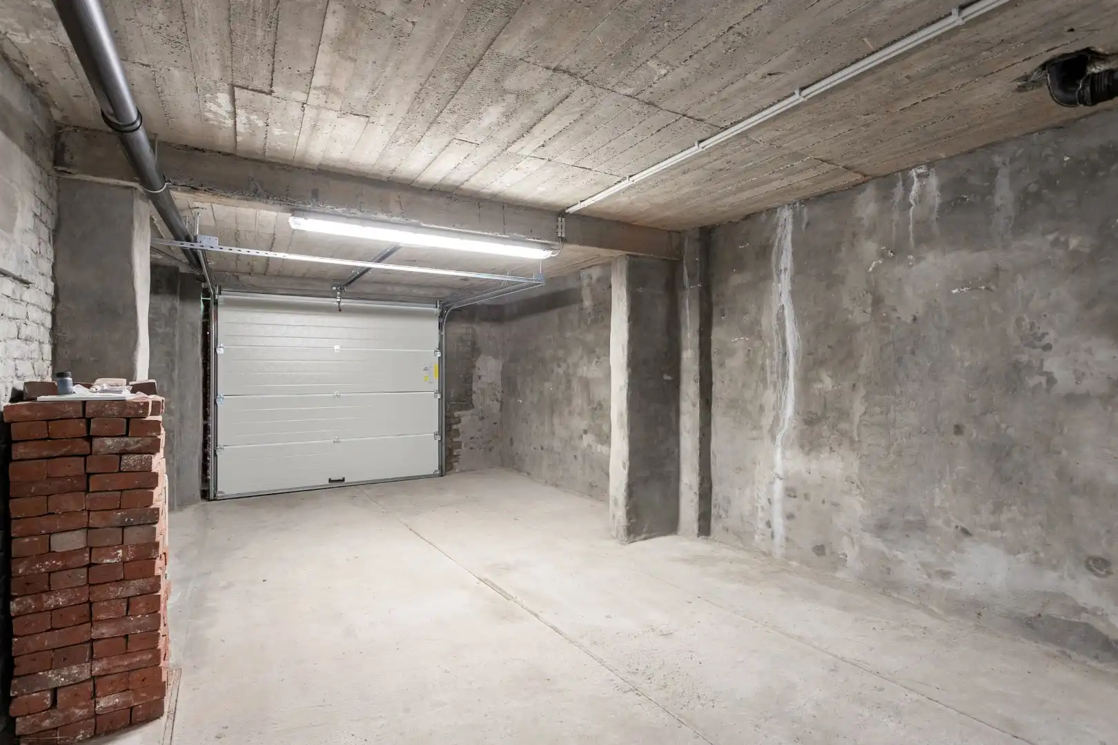 Handelshuis met woongedeelte, garage en tuin te Beersel foto 25