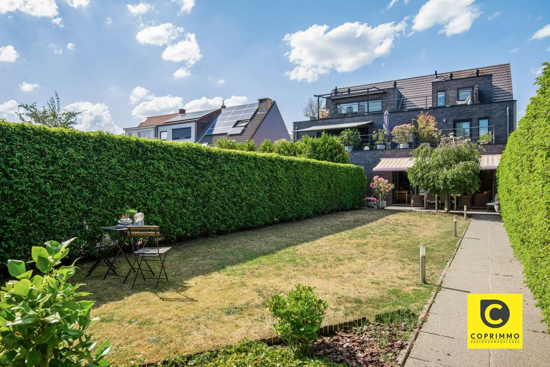 Prachtig duplex: 2 slk met tuin en 2 P  foto {{pictureIndex}}