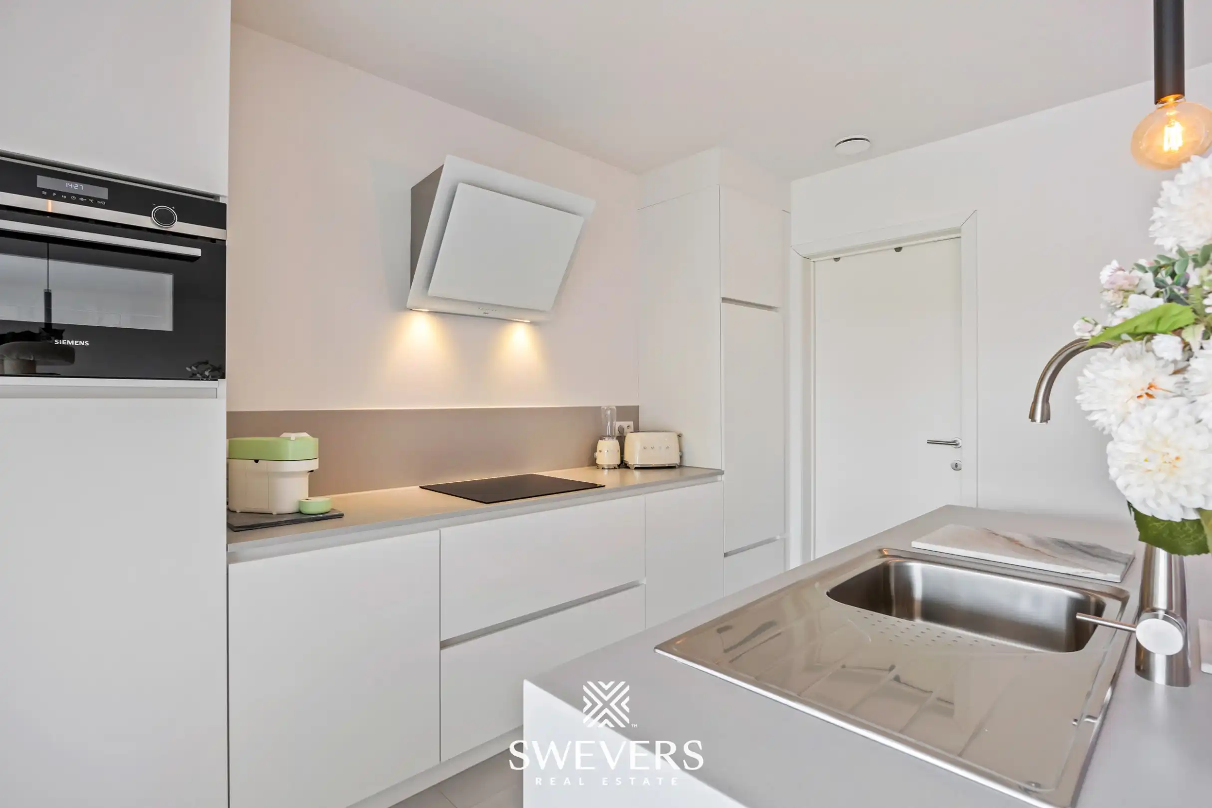 Nieuwbouwappartement met ruim terras, privétuin en ondergrondse staanplaats foto 6