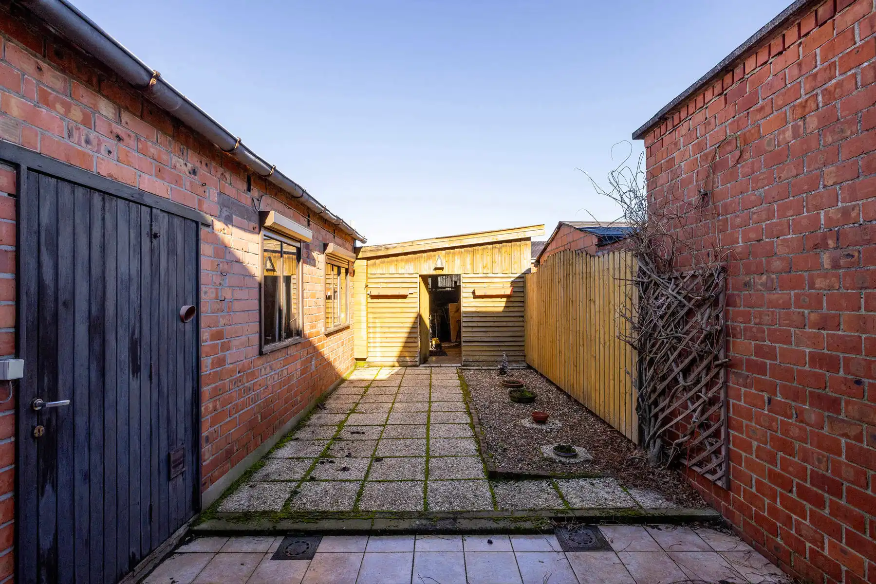 Te renoveren woning met 3 slpk, inpandige garage en tuin foto 20