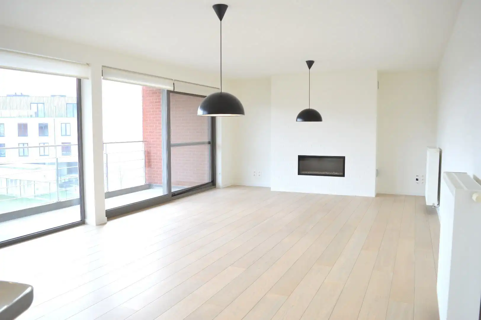 Ruim instapklaar appartement met 3 slaapkamers en autostaanplaats te koop nabij centrum Harelbeke foto 2