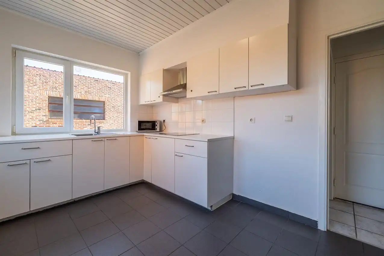 Verzorgde woning met 2 slpk., tuin en garage foto 8