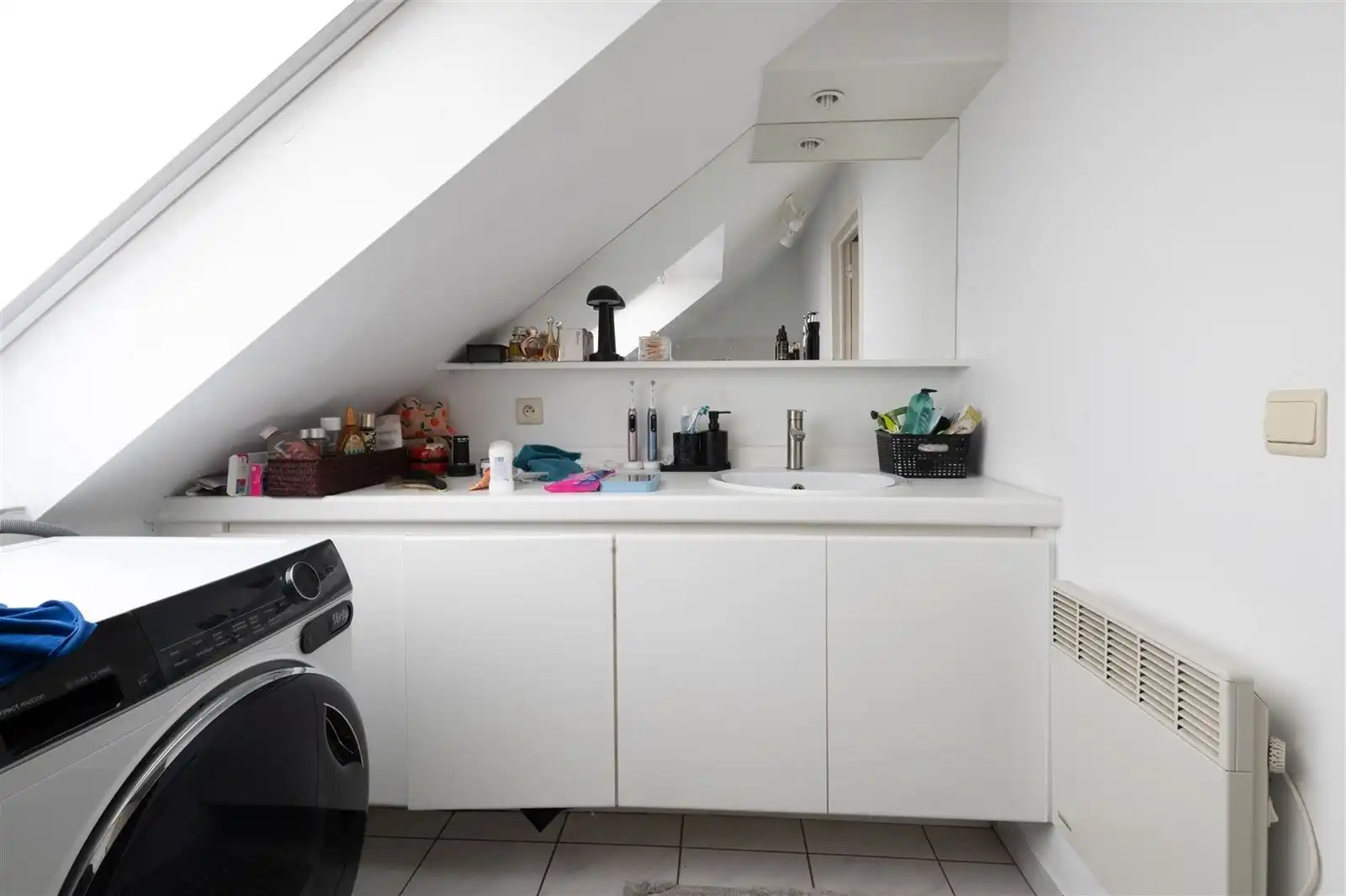 Lichtijke penthouse met terras en garagebox foto 8