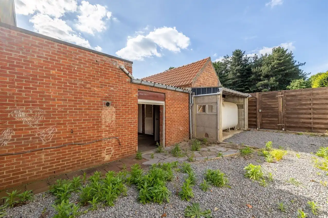 Karaktervolle woning met grote tuin, bijgebouwen en uitbreidbaar zoldervolume op een verrassend diep perceel foto 35