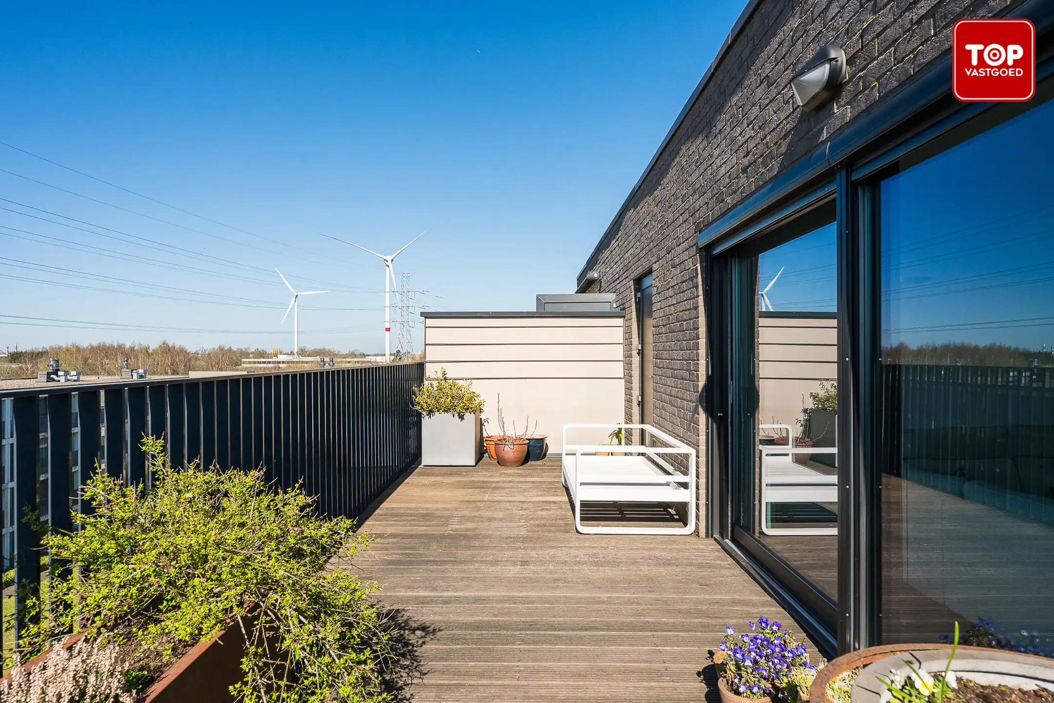 Hoogwaardig afgewerkte penthouse met 45m² terras. 2 slaapkamers, garage en staanplaats!  foto 11