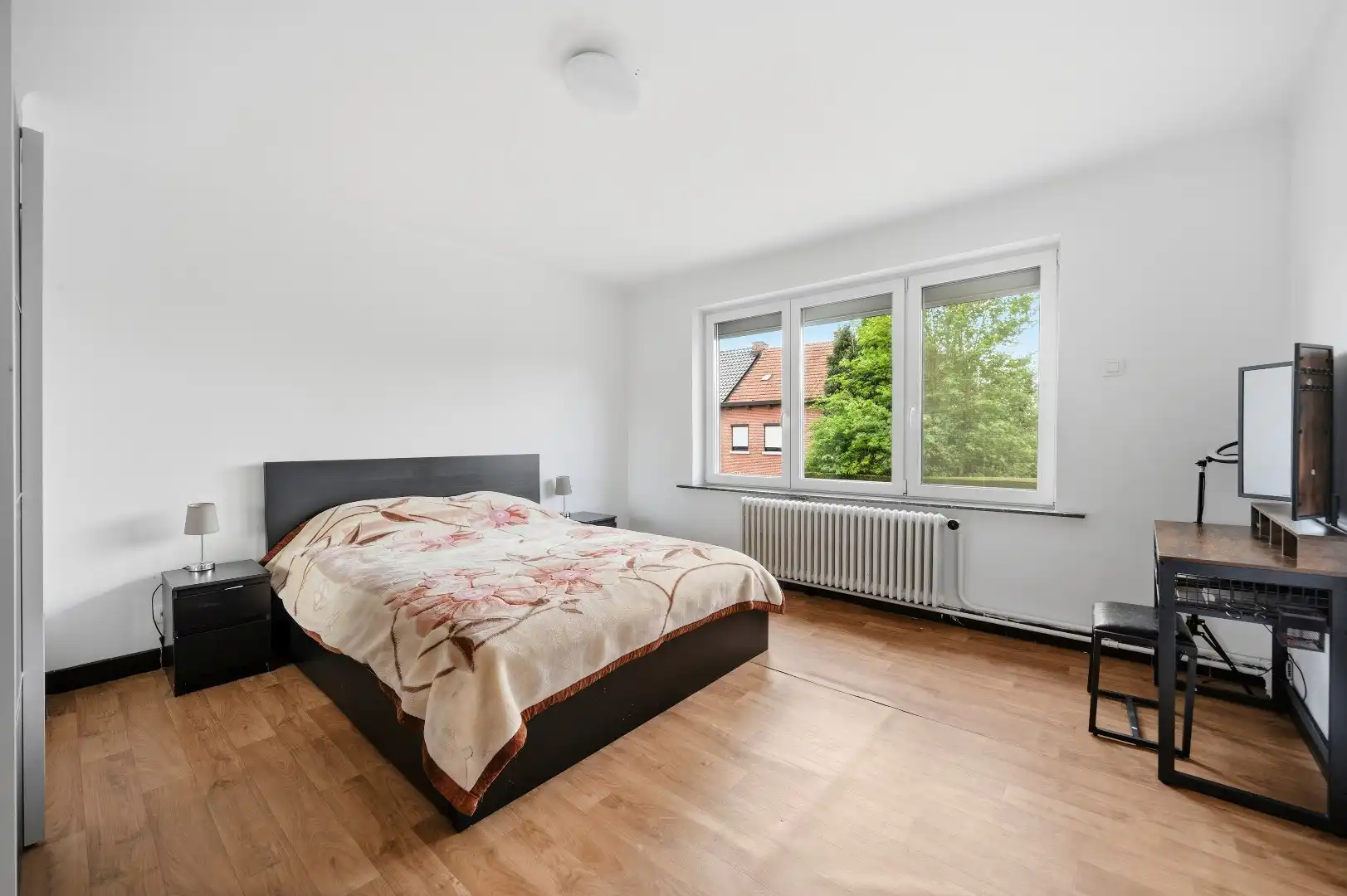 Instapklare rijwoning in een rustige straat te Tienen foto 16