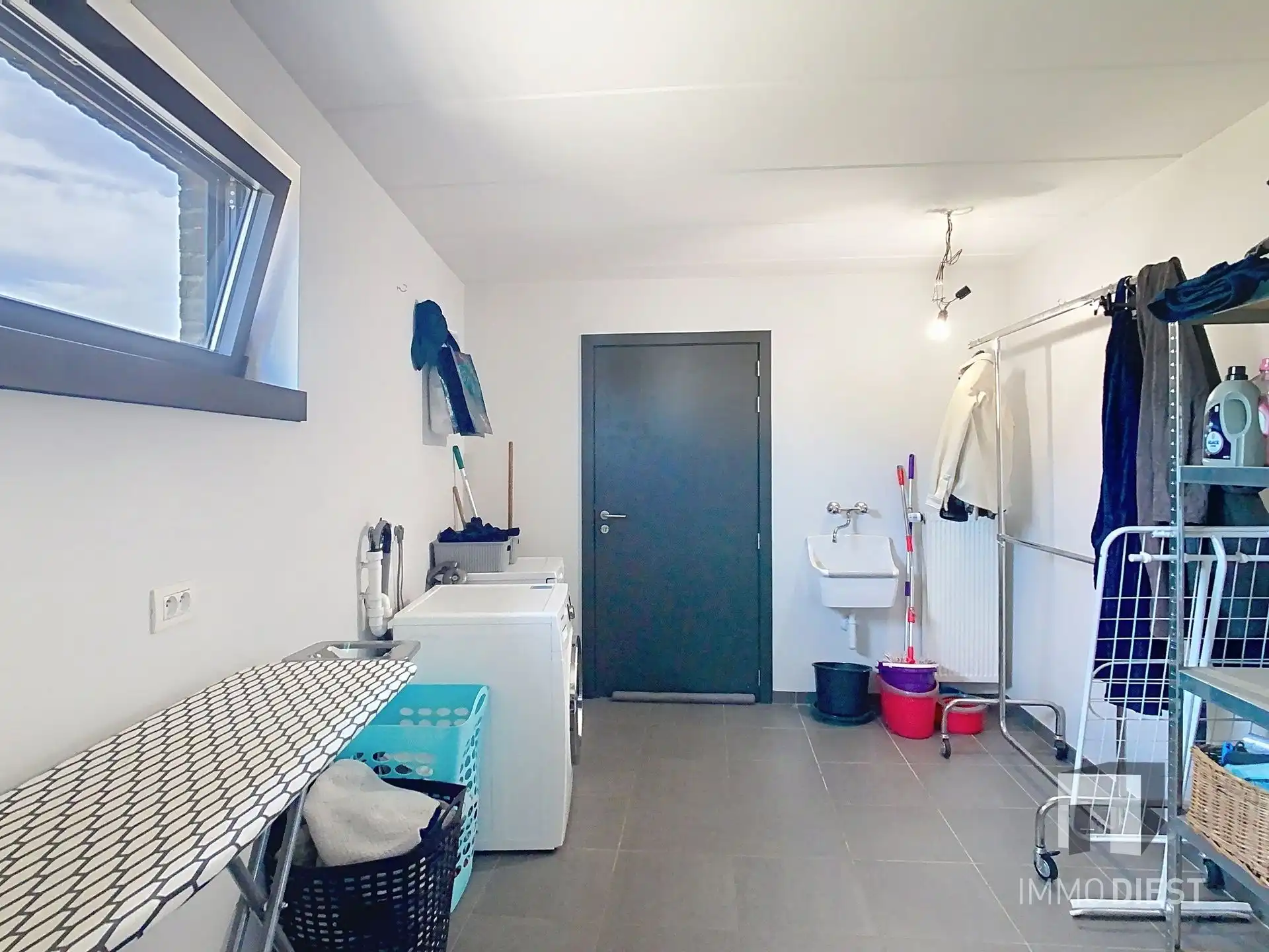 Moderne, lichtrijke woning met aangename tuin aan de voet van hartje Scherpenheuvel. foto 9