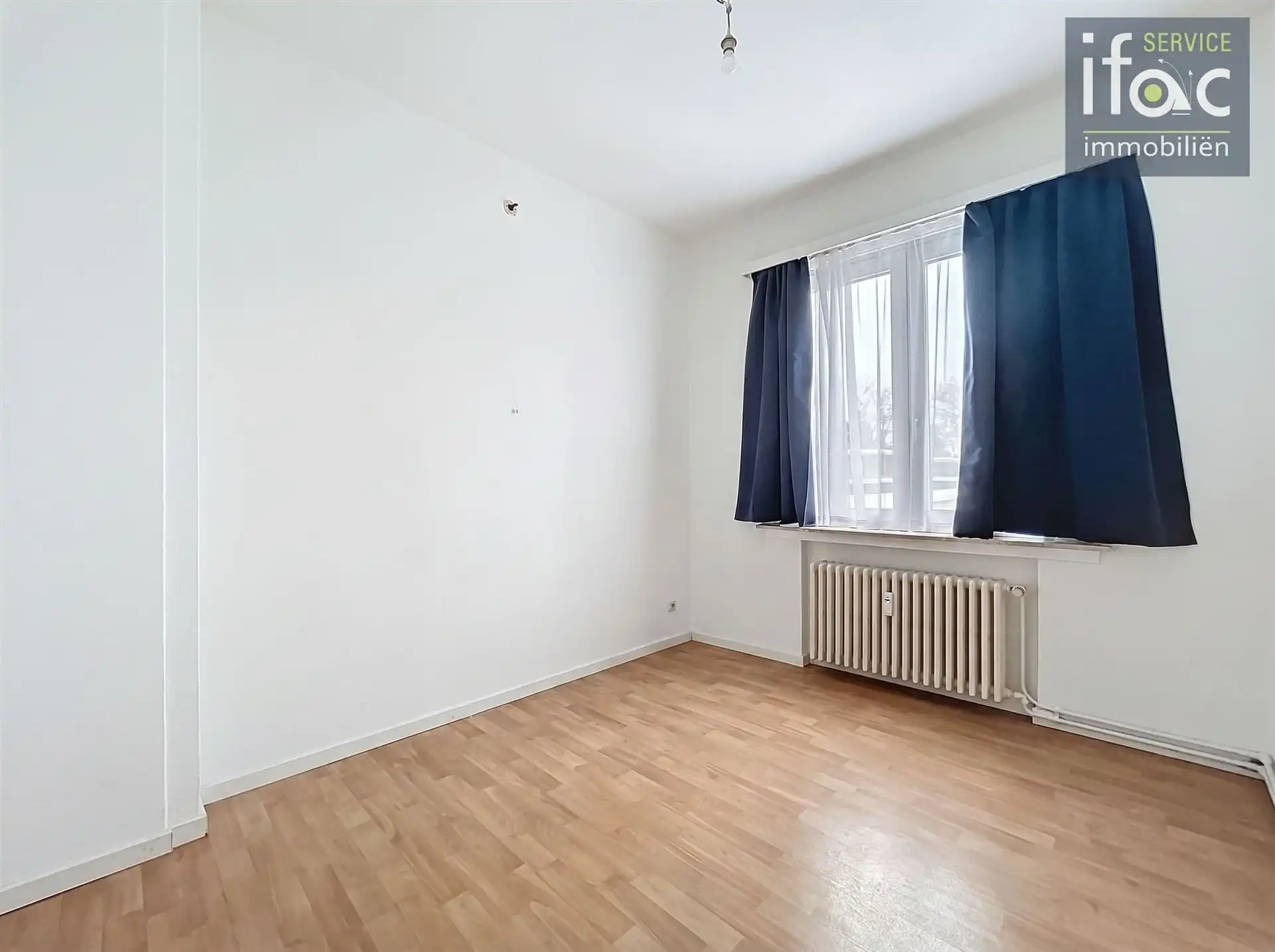 Lichtrijk goed onderhouden appartement op de 4e verdieping foto 16