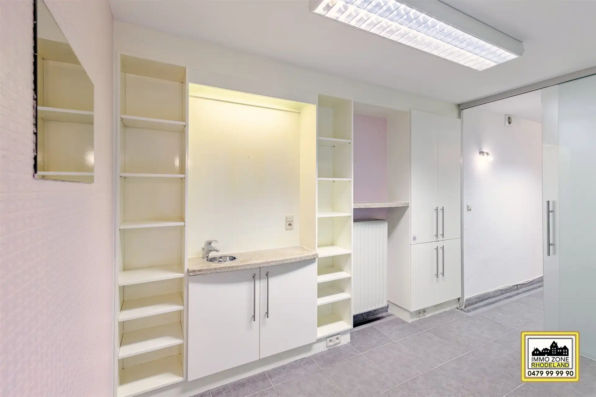 Prachtig gelijkvloers appt met 2 tot 3 slpks en leuke tuin foto 4