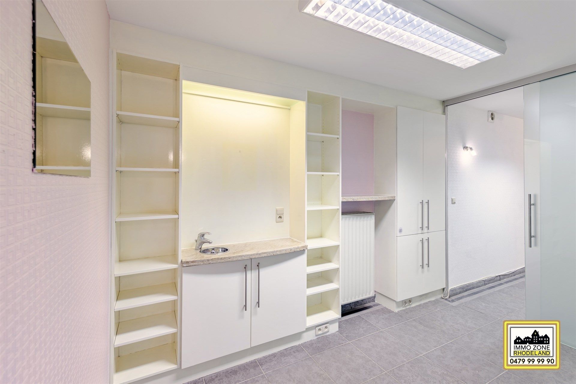 Prachtig gelijkvloers appt met 2 tot 3 slpks en leuke tuin foto 4