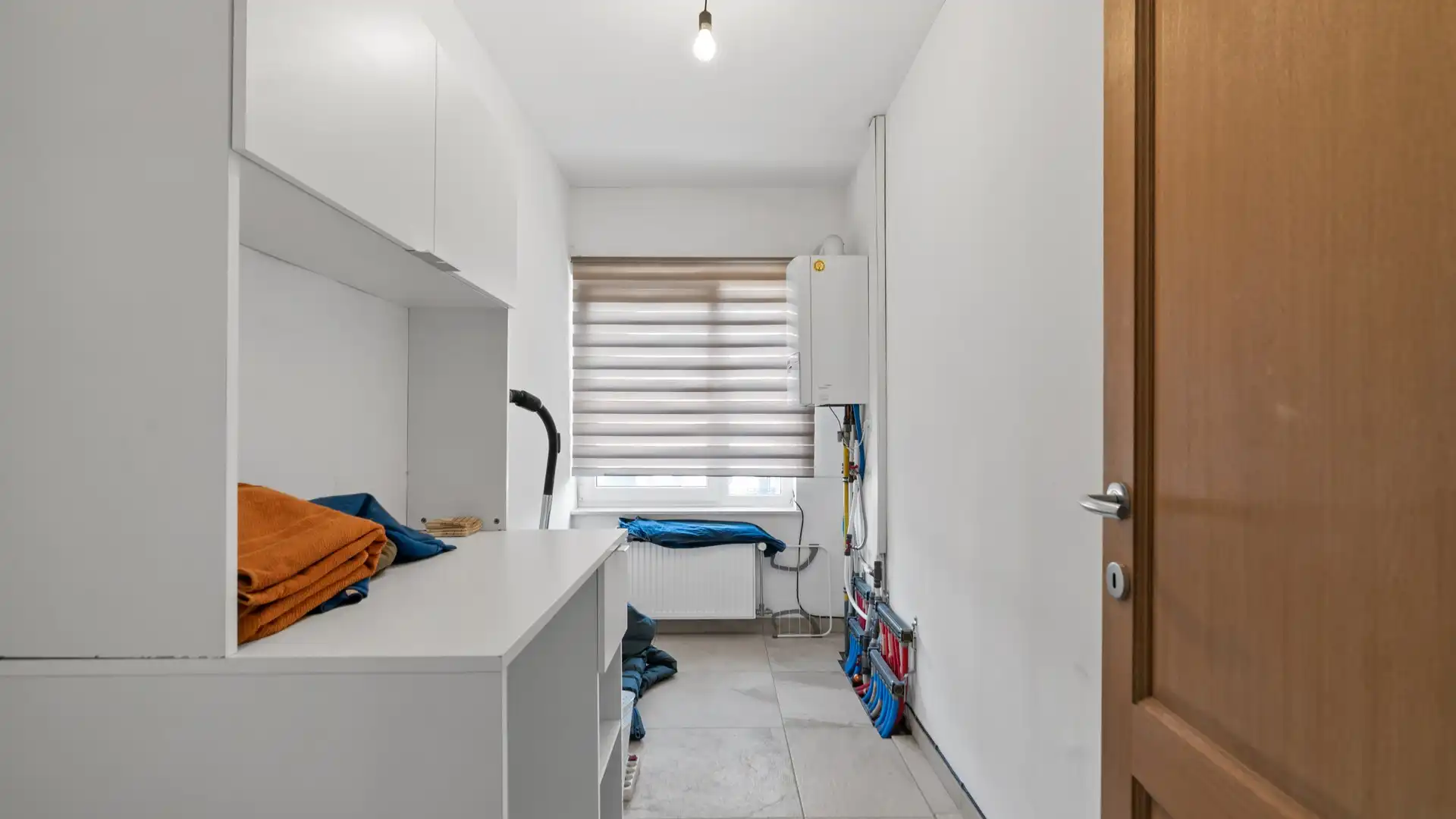 Wonen boven je zaak? Ontdek deze instapklare opportuniteit in het hart van Maasmechelen foto 22