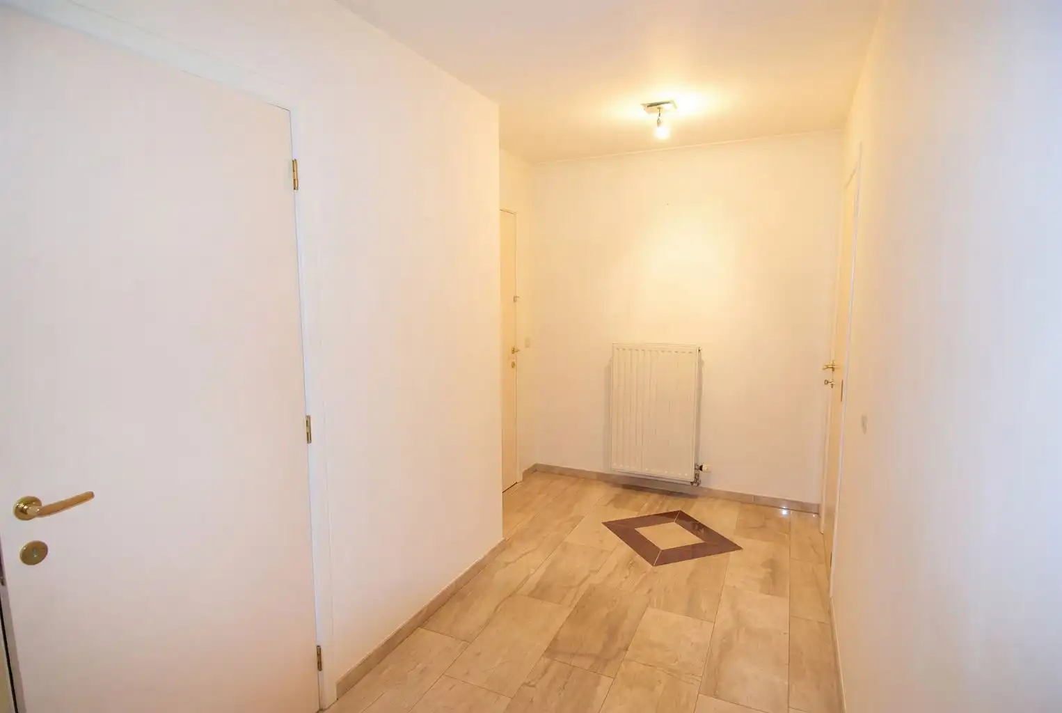 Ruim appartement met 2 slaapkamers, 2 terrasjes en ondergrondse autostaanplaats foto 5