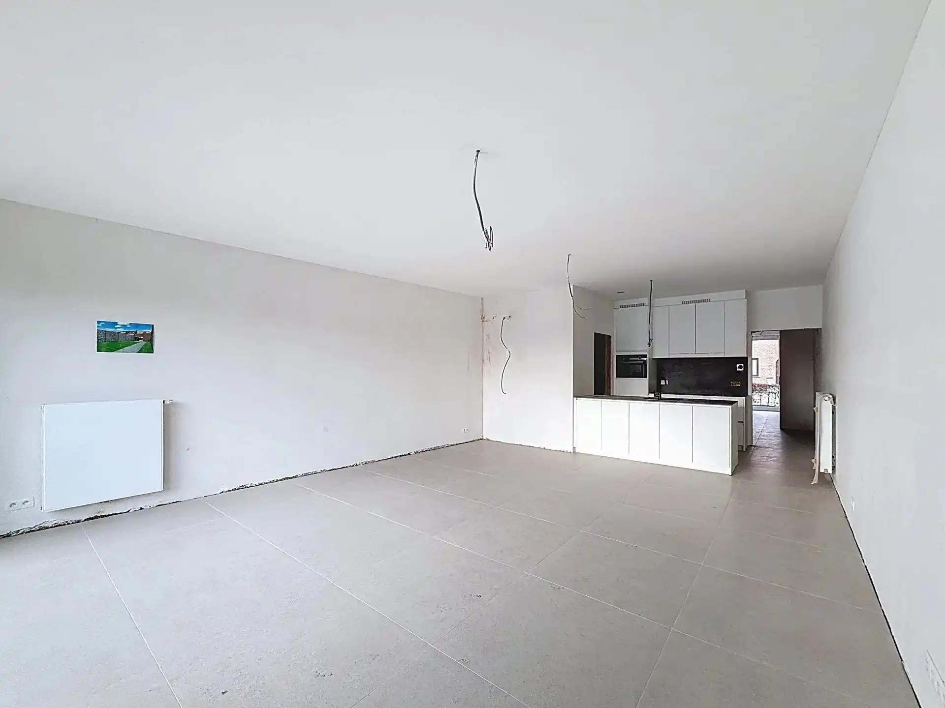 Luxueus en modern afgewerkt gelijkvloers appartement met tuin, 1 slaapkamer en 2 staanplaatsen. foto 3