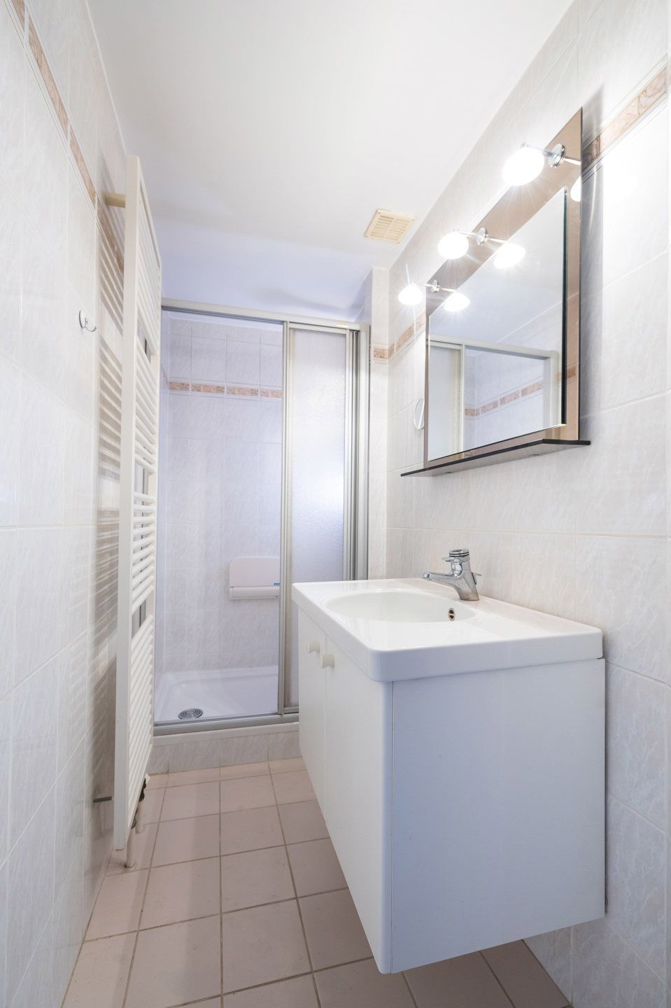 Appartement met 2 slaapkamers + zolder + garage + buitenparking inbegrepen foto 15