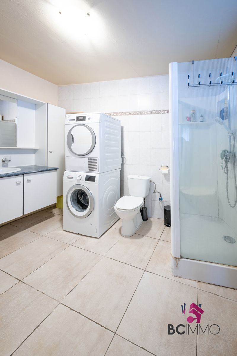 Karaktervolle woning met ruime tuin te Genk foto 10