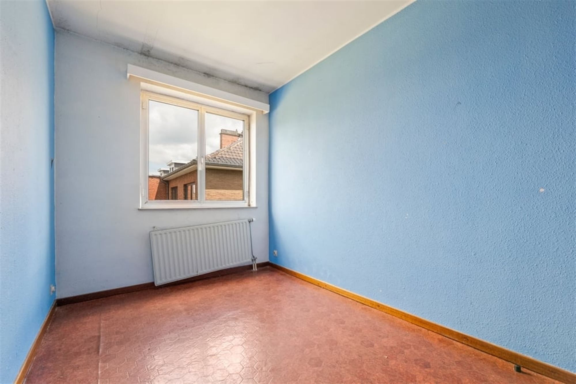 OPBRENGSTEIGENDOM MET 6 APPARTEMENTEN EN 4 STAANPLAATSEN IN SINT-TRUIDEN  foto 24