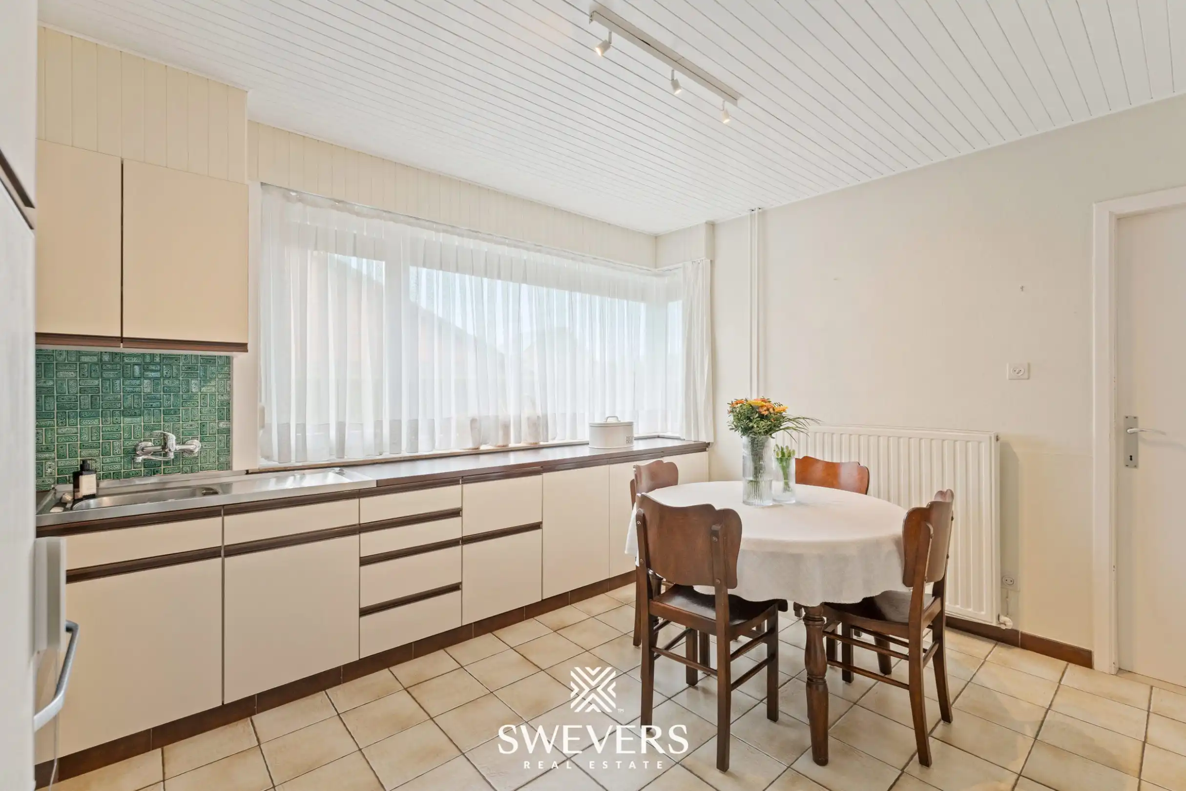 Te renoveren woning met potentieel en grote tuin in residentiële buurt vlakbij centrum Diepenbeek foto 14