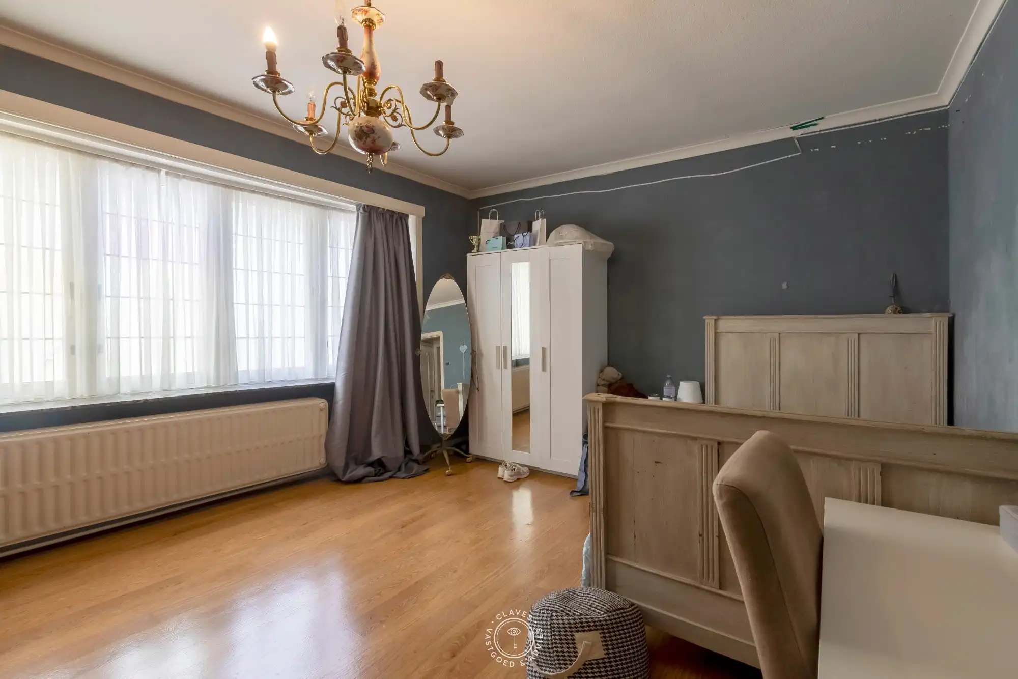 Opbrengsteigendom (ruime burgerwoning) bestaande uit 2 appartementen en garage foto 23