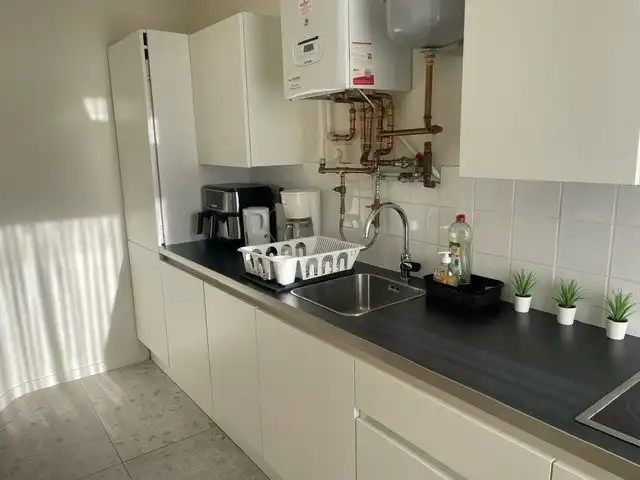 Appartement te huur in centrum van Heist  foto 2