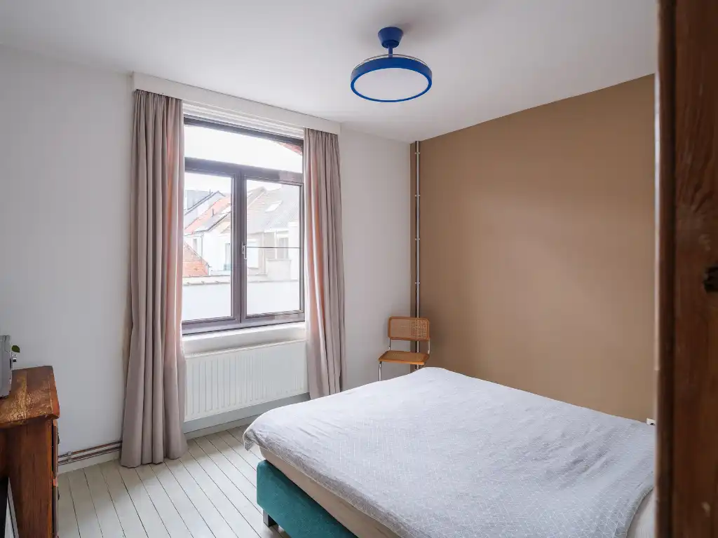 Charmante rijwoning met drie slaapkamers en een geborgen, gezellige buitenruimte foto 13