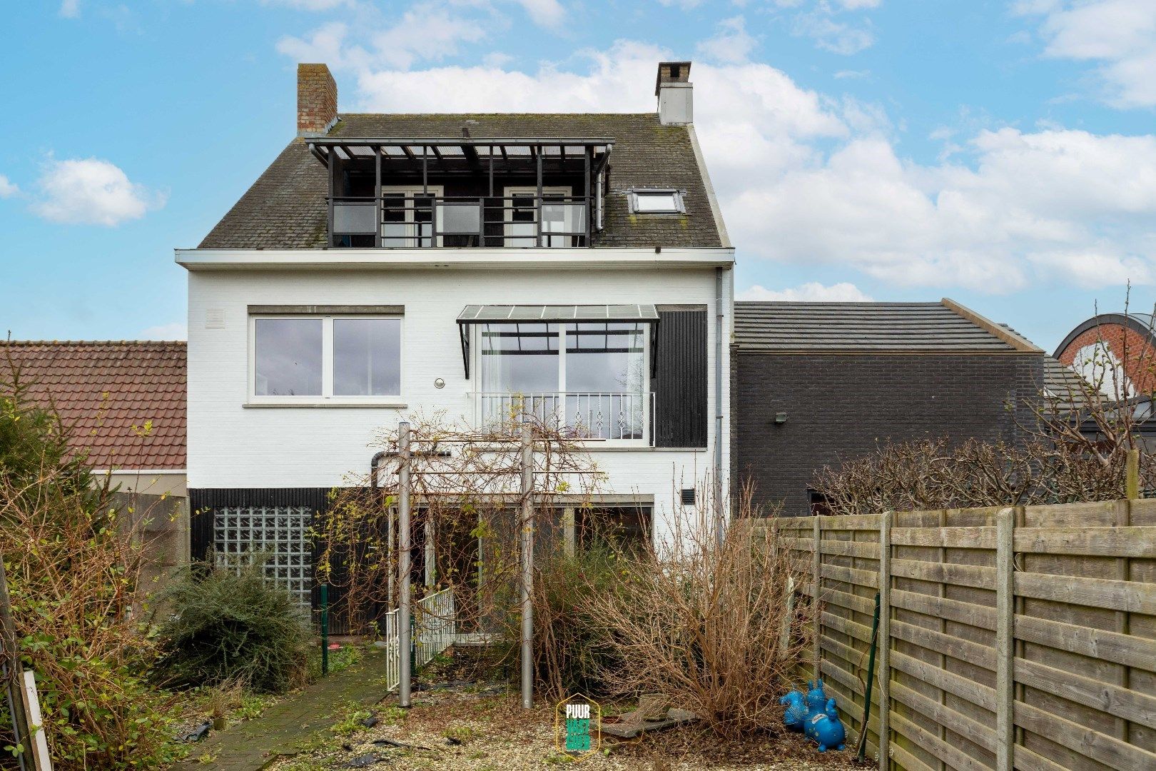 Verrassend ruime woning met grote garage, tuin en praktijkmogelijkheid of kangoeroewoning te Sint-Kruis. foto 24