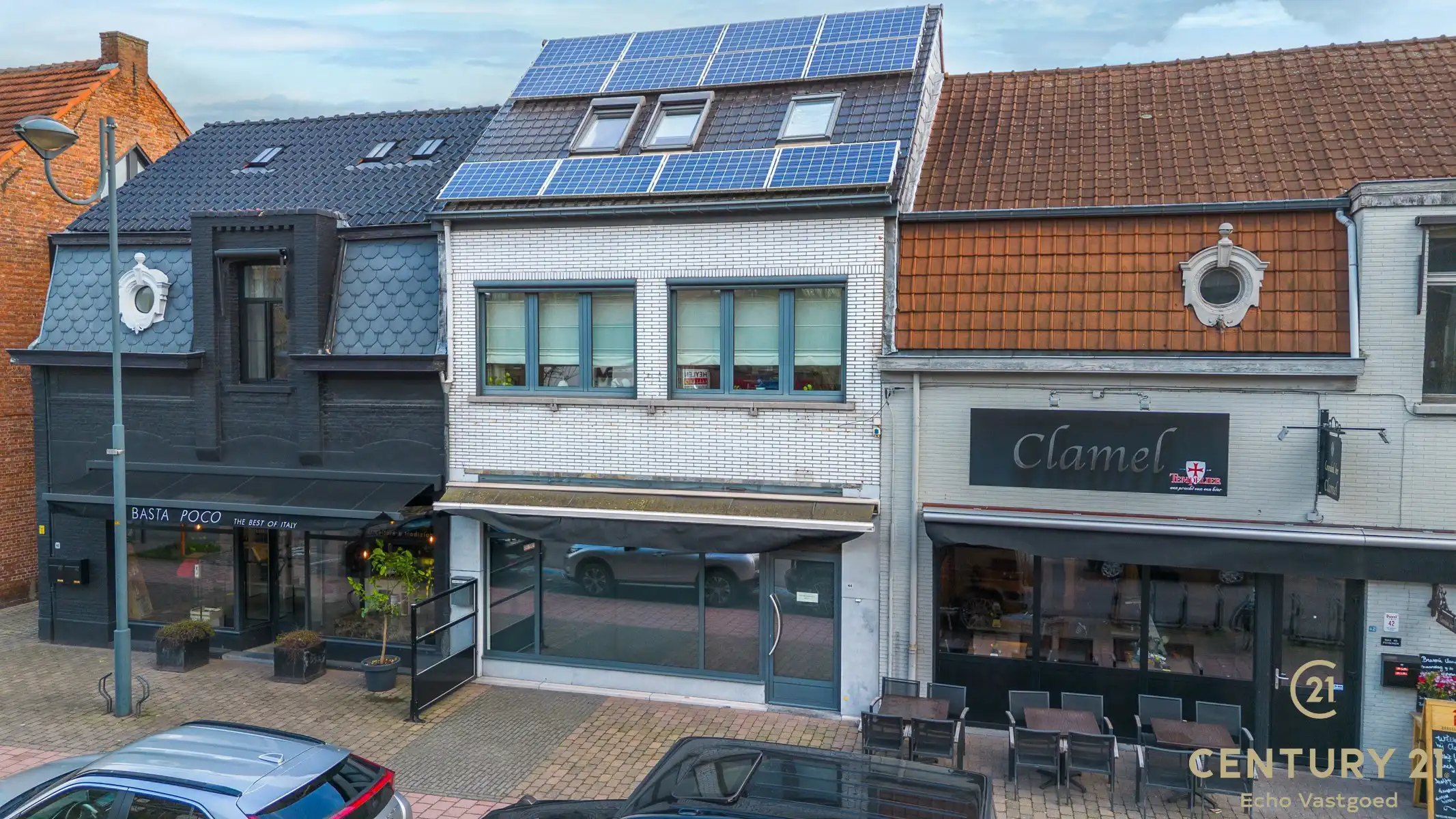 Handelszaak met gerenoveerde woonst op topligging  foto 2