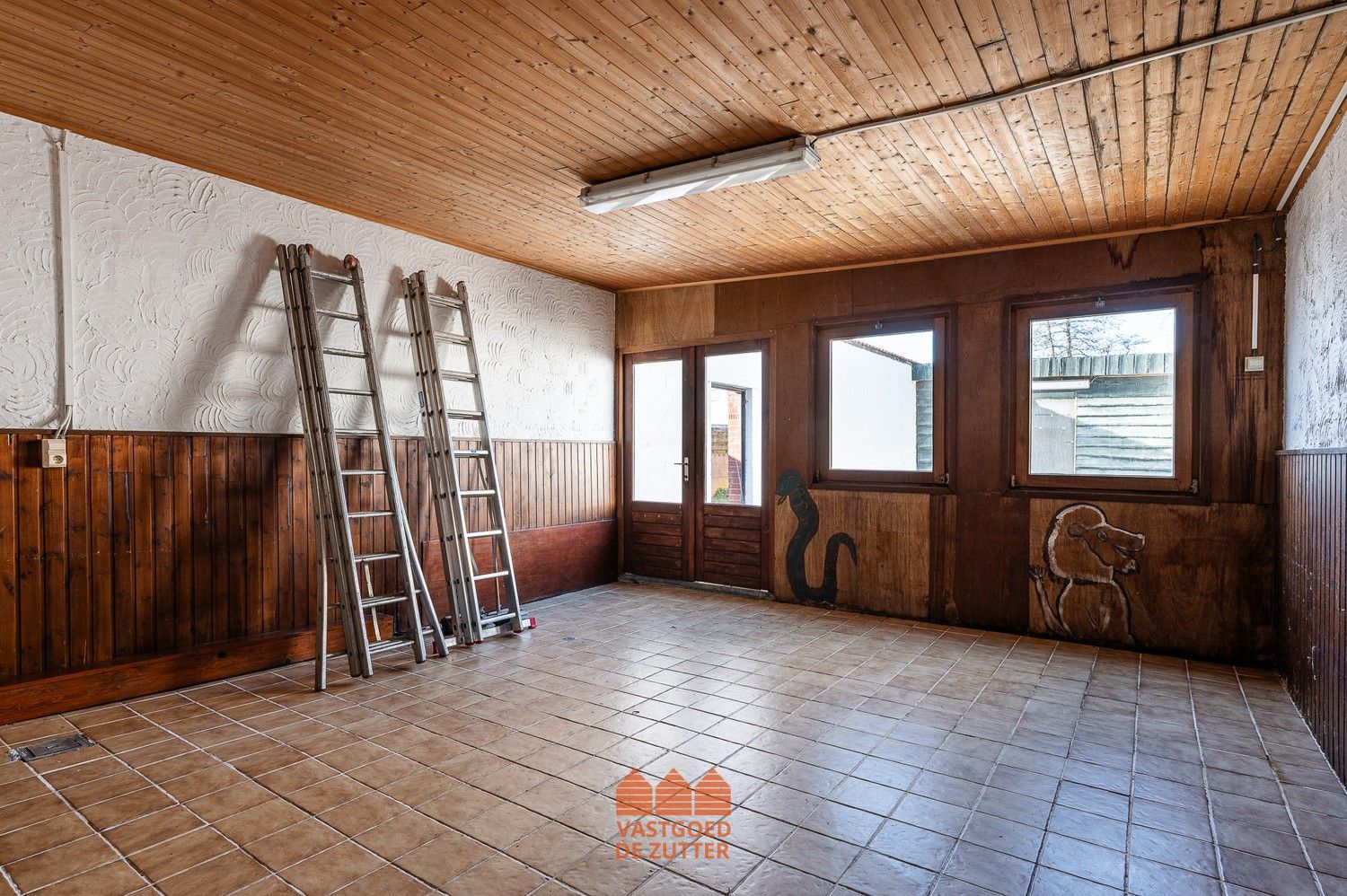 Ruime woning met handelspand in het centrum van Boekhoute foto 20