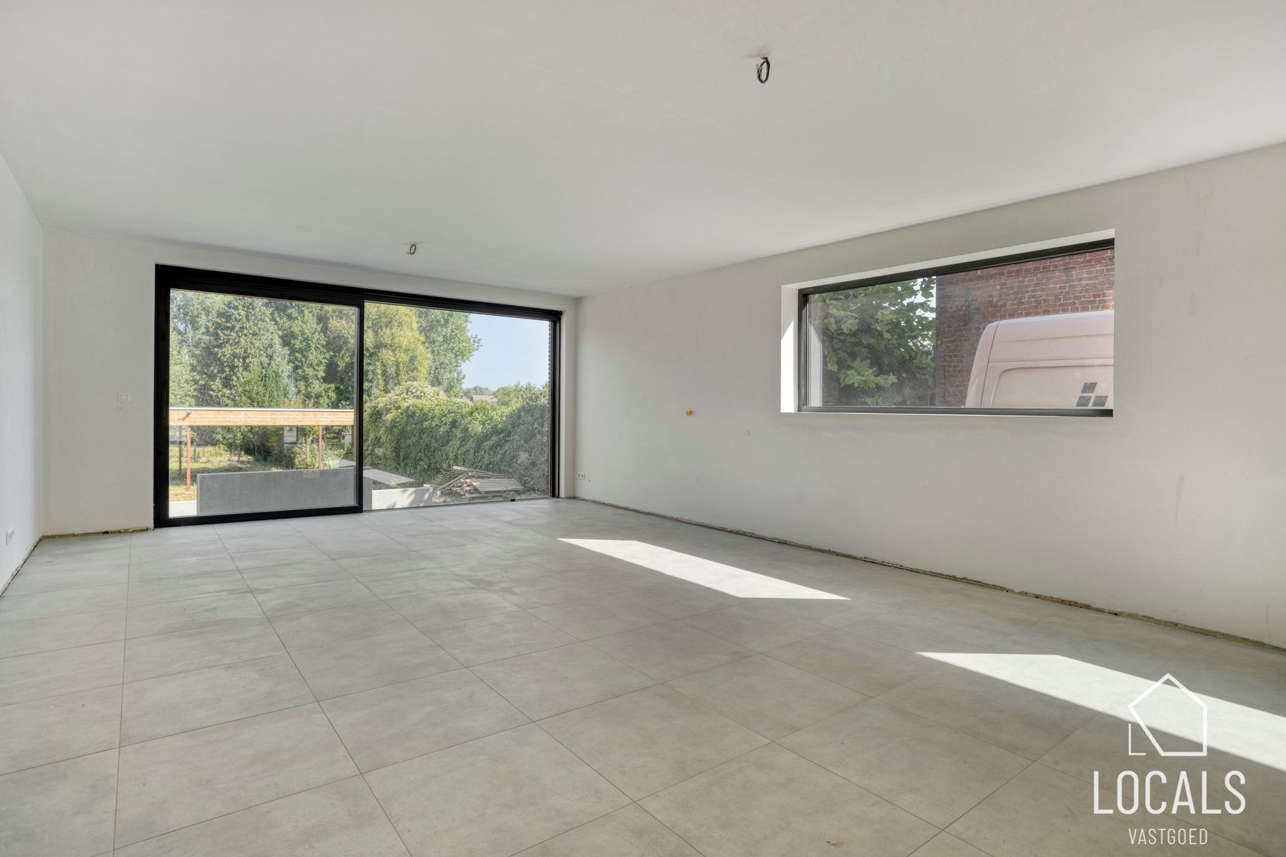 Ruime triplex-woning met 4 slaapkamers en 2 badkamers foto 4