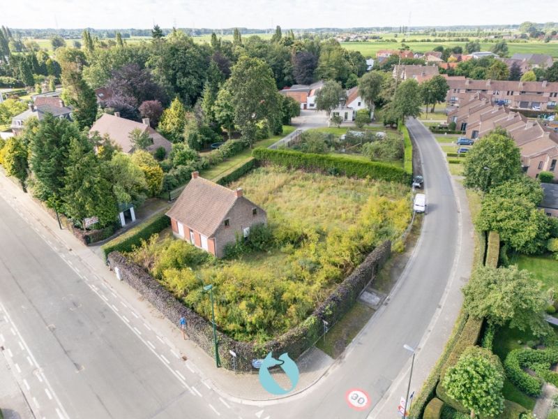Bouwgrond van 1.322m² - vergunning voor 3 woningen aanwezig foto {{pictureIndex}}