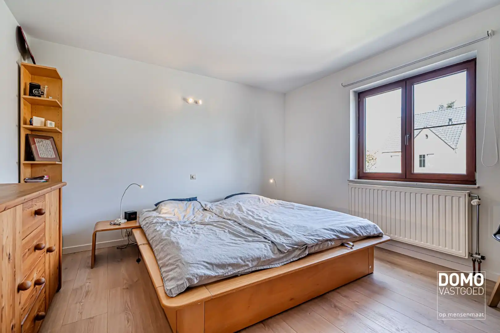 ZUIDWESTELIJK GEORIËNTEERDE DOORZONWONING MET LICHTRIJKE AANBOUW, GEZELLIGE TUIN EN RUIME GARAGE TE KURINGEN (HASSELT)  foto 14