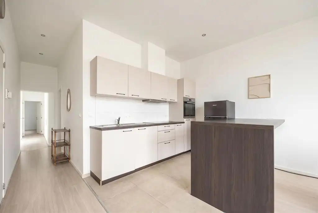 Lichtrijk appartement op het bovenste verdiep foto 4