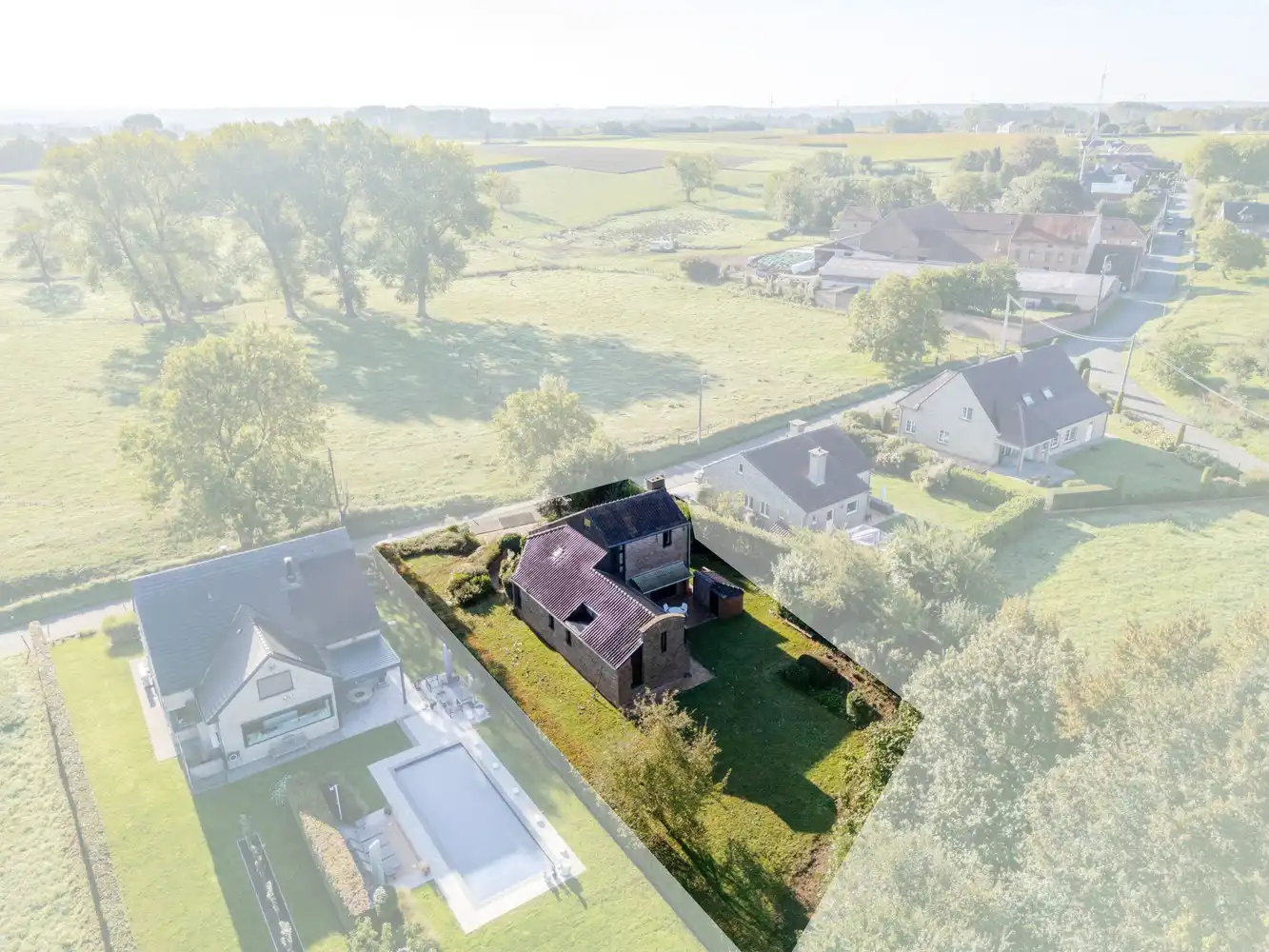Modernistische, lichtrijke villa met 3 slaapkamers, kantoor en zuidgerichte tuin op toplocatie in groene rand rond Brussel! foto 2