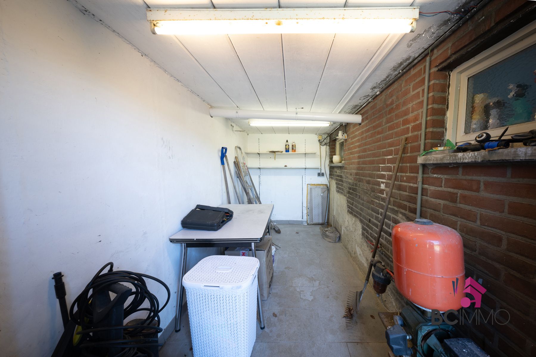 Instapklare woning  met 3 slaapkamers, airco en diepe tuin foto 14