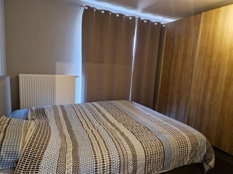 Prachtig gelijkvloersappartement met 2 slaapkamers,  tuin en garage foto 10