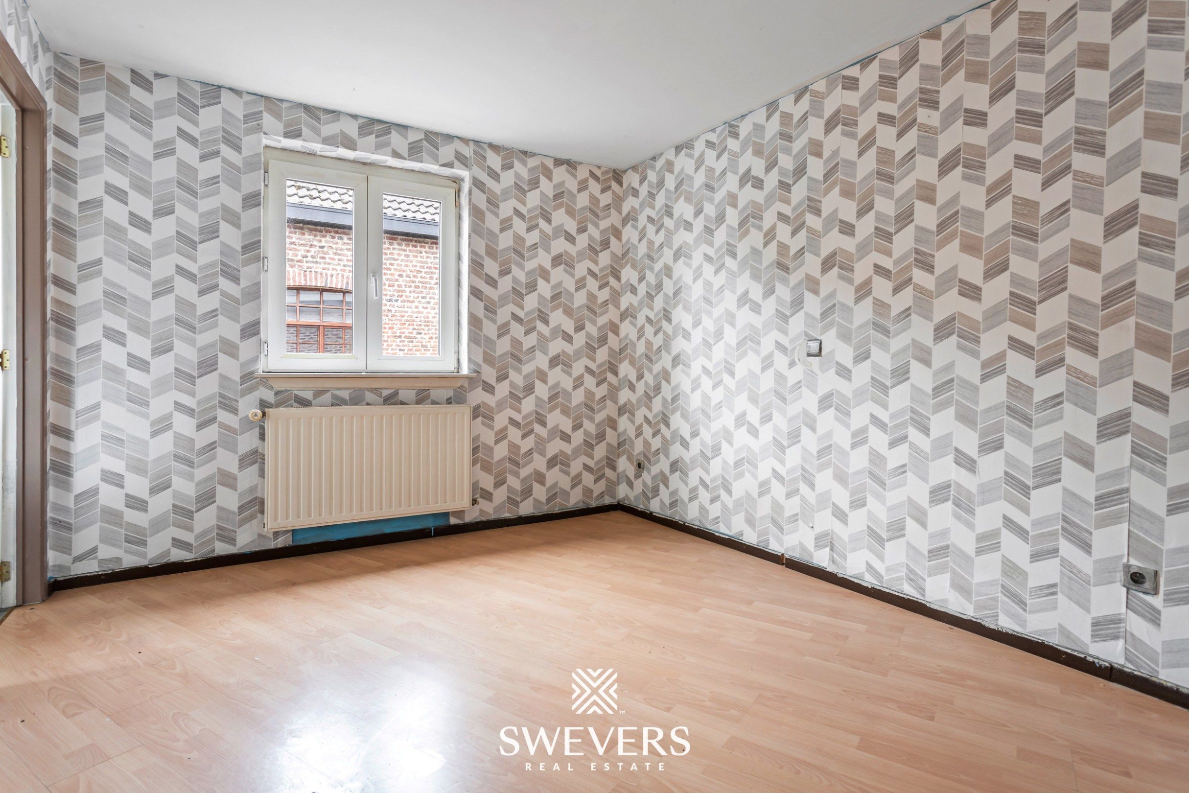 Charmante hoekwoning met potentieel in hartje Tongeren foto 10