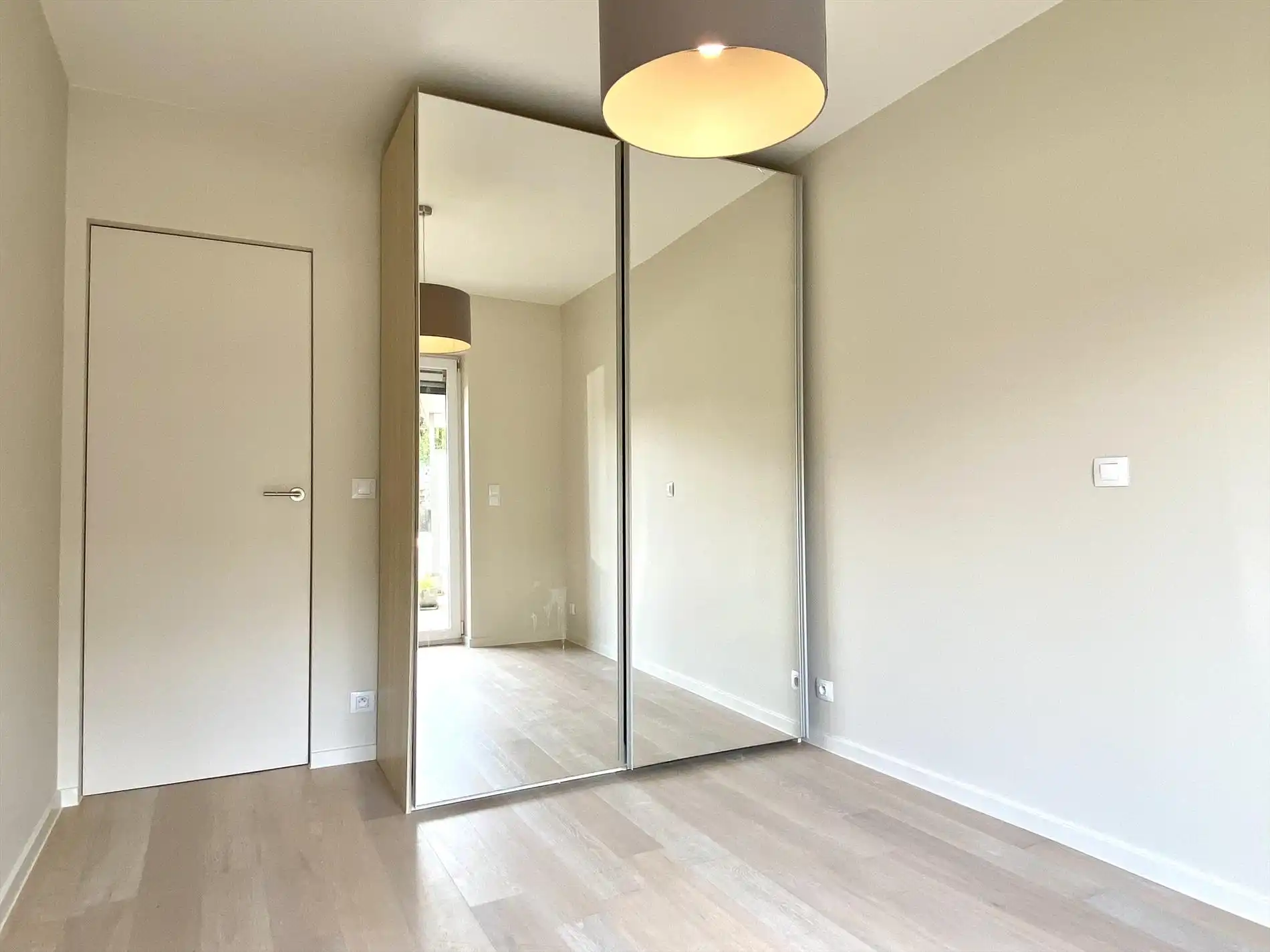 Ontdek dit prachtig gelijkvloers appartement met tuin en zicht op de Leie te Harelbeke! foto 9
