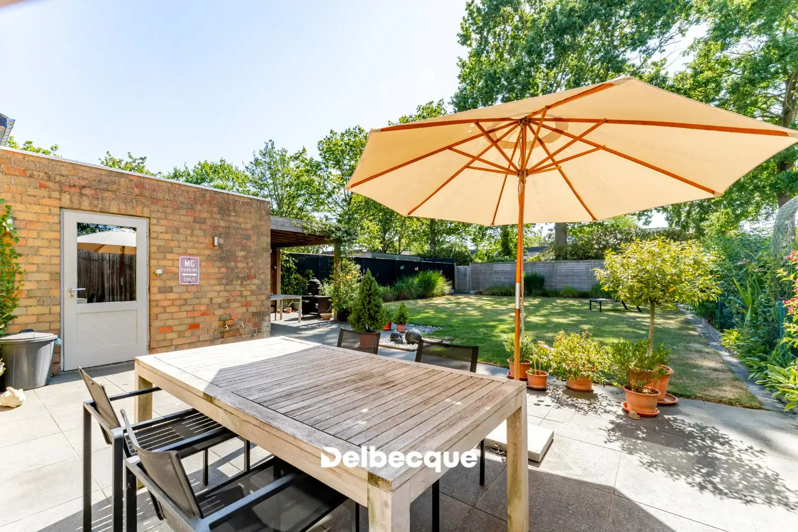 Perfect onderhouden halfopen woning met ruime tuin in residentiële woonwijk te St-Kruis foto 5