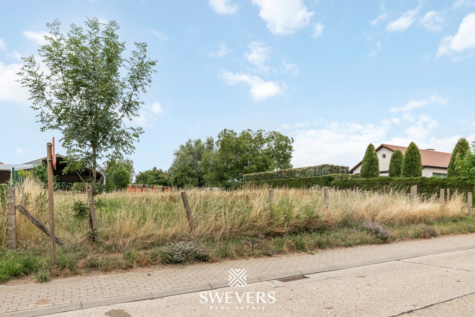 Charmant gelegen bouwgrond voor halfopen woning in Riemst foto 6