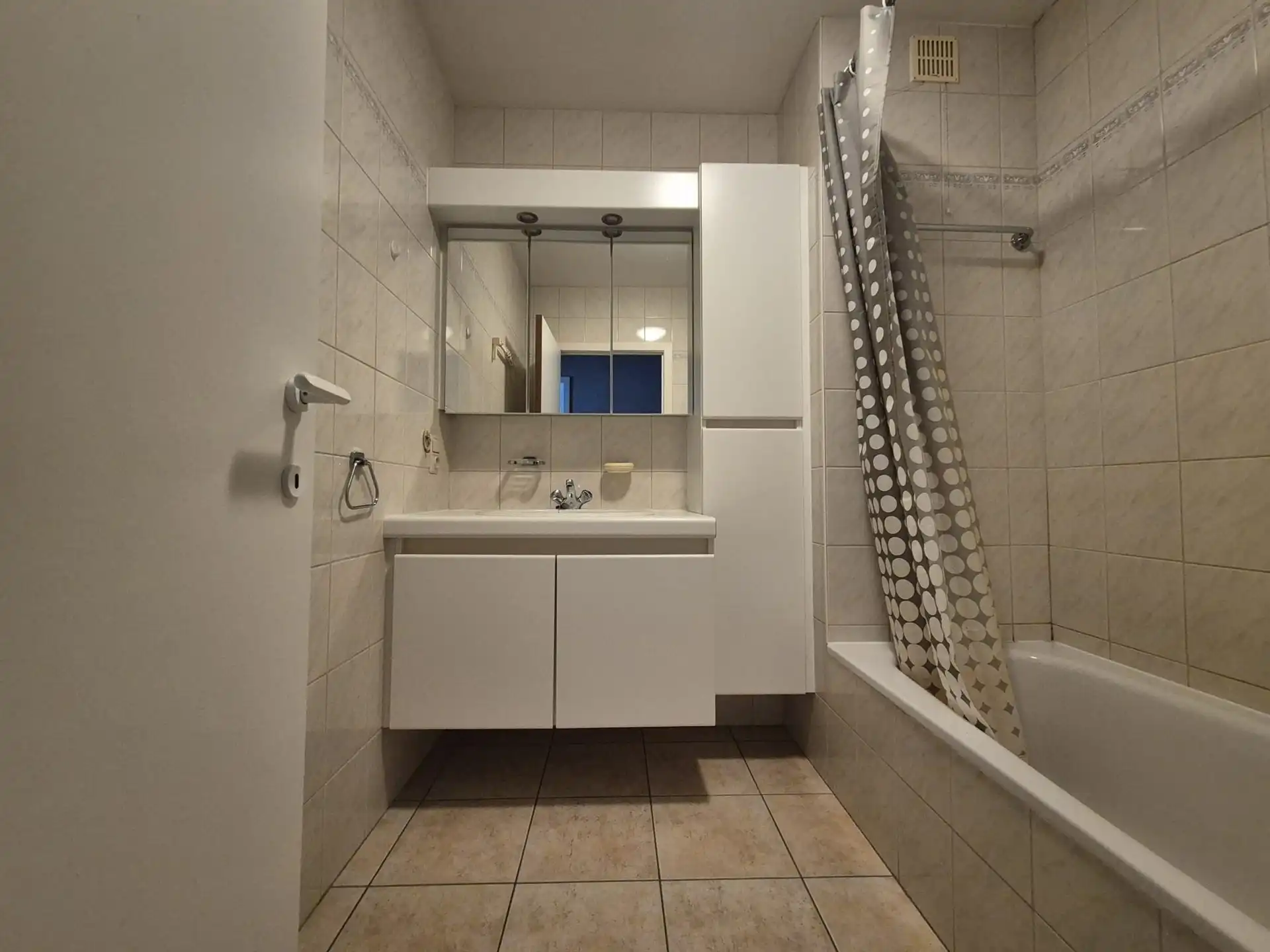 Ruim appartement met garage gelegen op het eerste verdiep vlakbij de Warande. foto 19