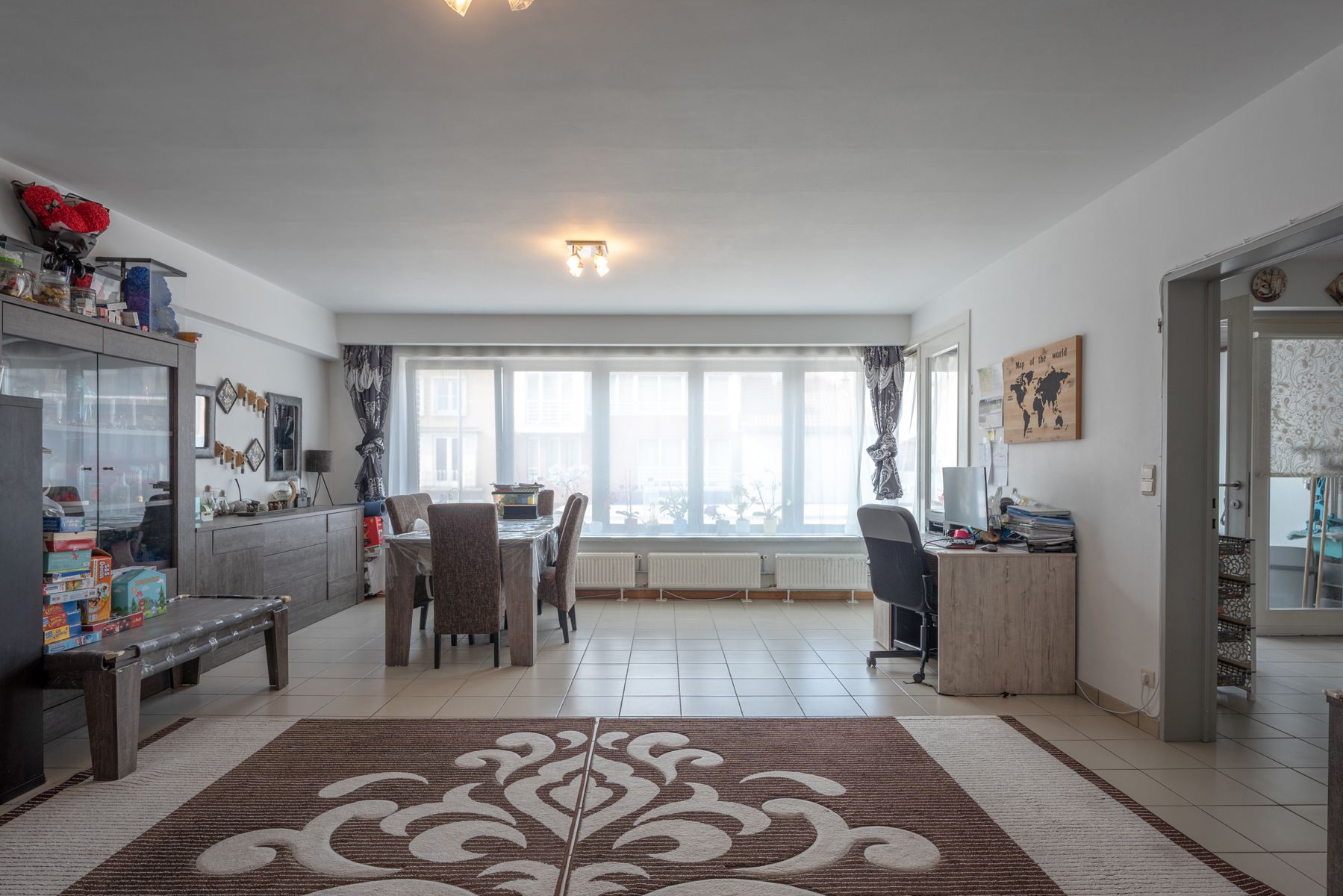 Goed gelegen appt met terras, kelder en parking voor de deur foto 3