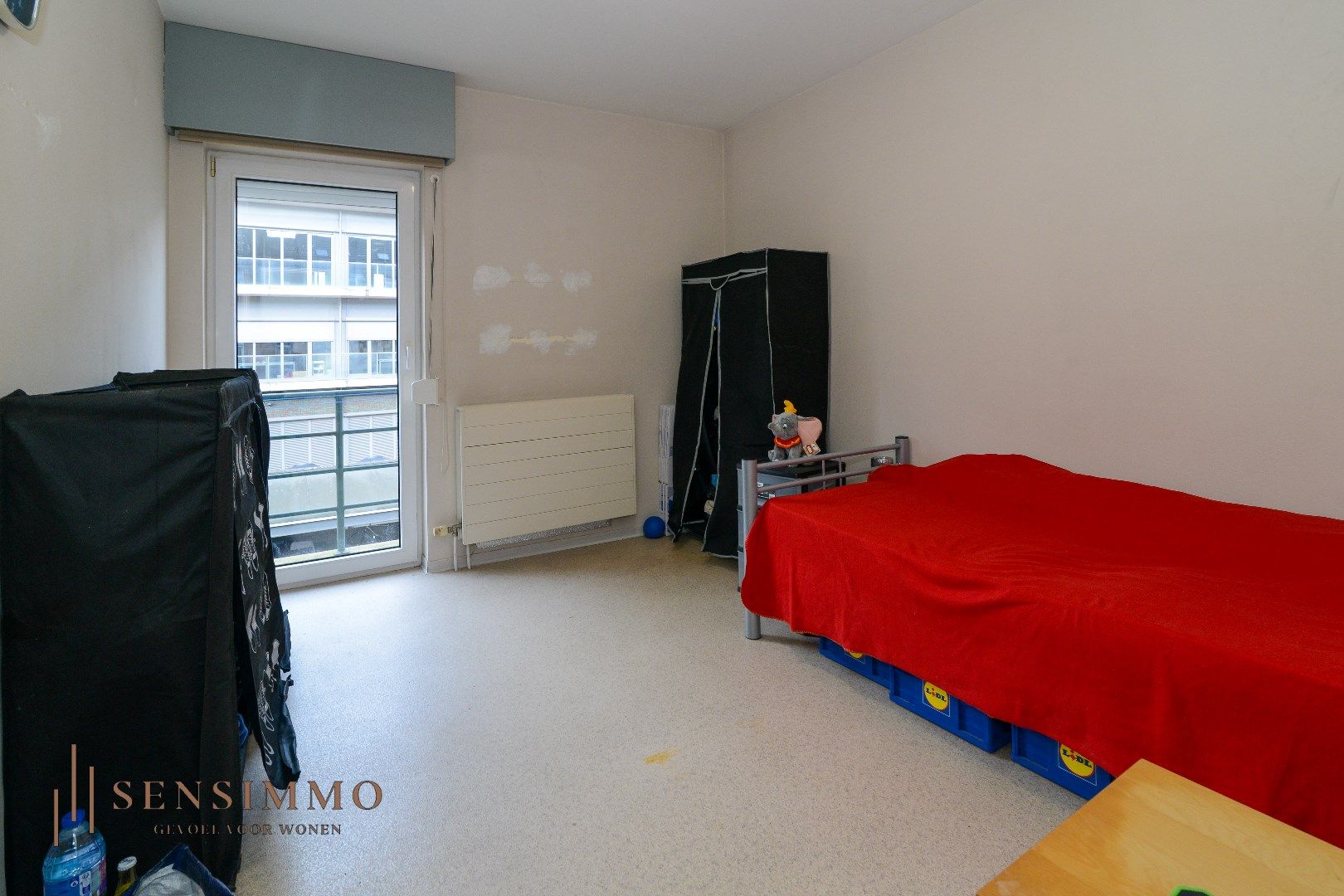 Centraal gelegen appartement in hartje Genk, ideaal voor eigen bewoning of investering! foto 12