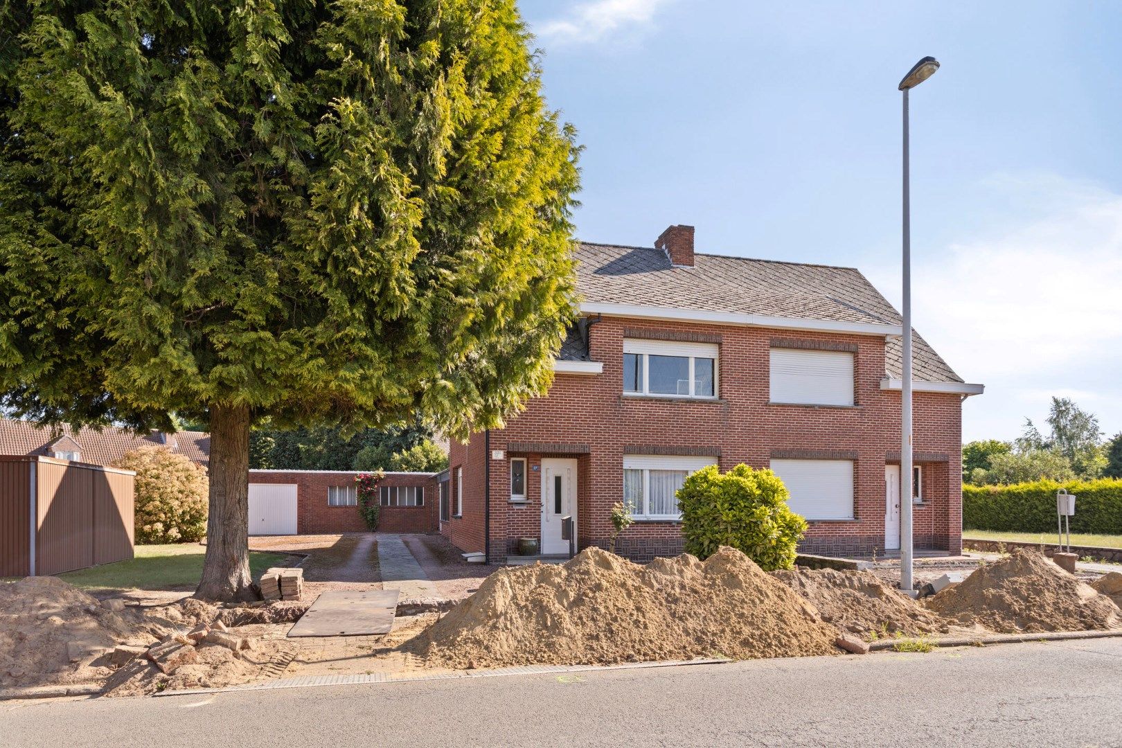 Te renoveren halfopen woning met 3 slaapkamers op een perceel van ca. 780 m² ! foto 28