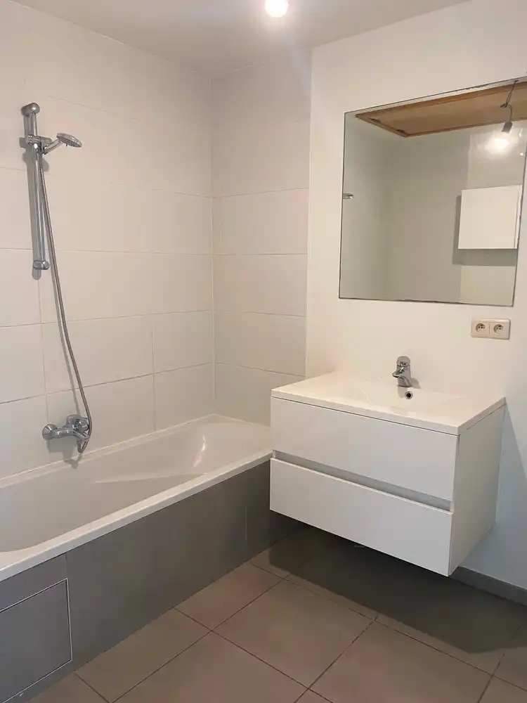 Te Huur – Gezellig 2-slaapkamerappartement in het centrum van Lembeek foto 2