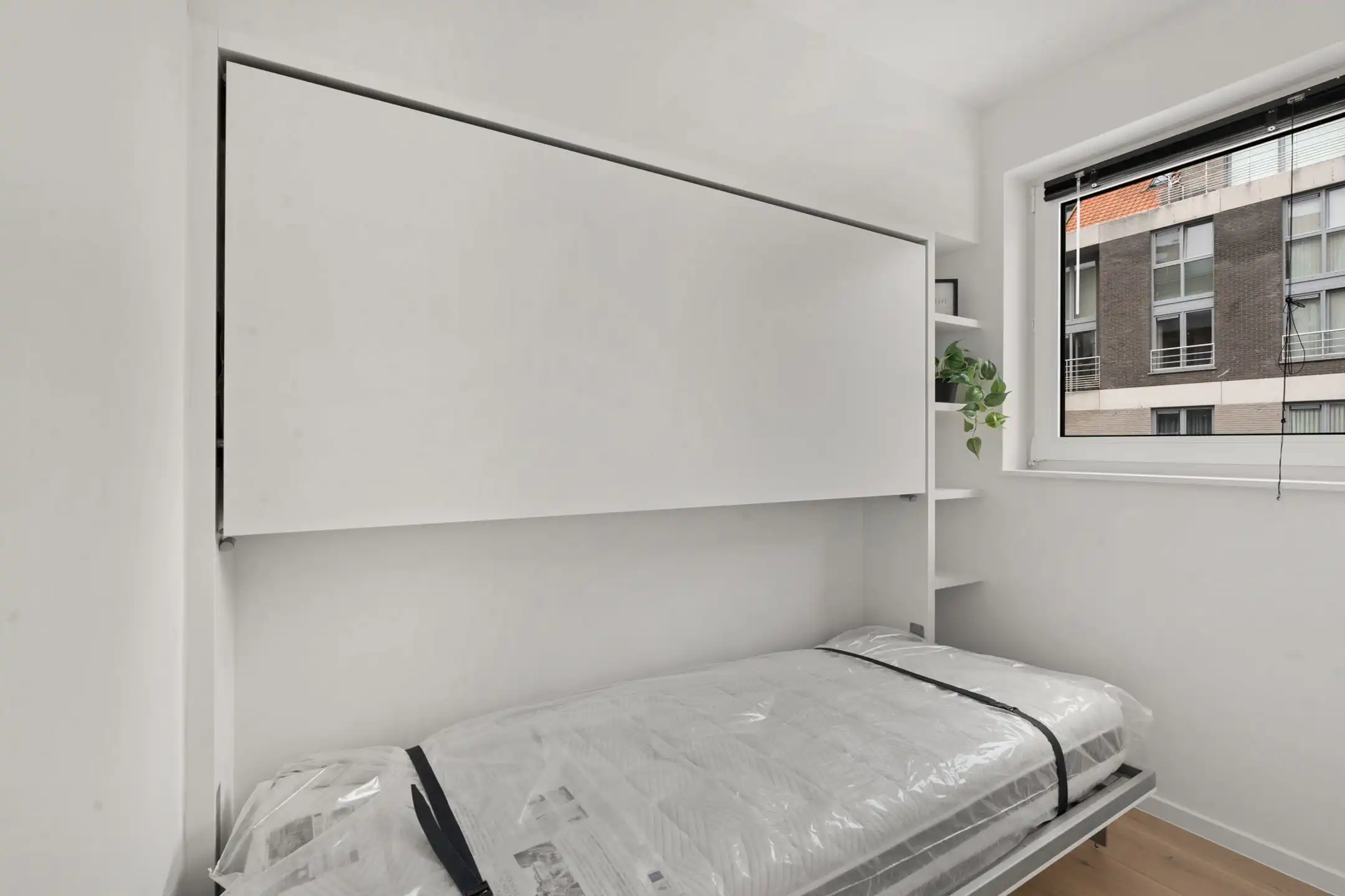 Prachtig gerenoveerd app met 2 slaapkamer centraal gelegen. foto 8