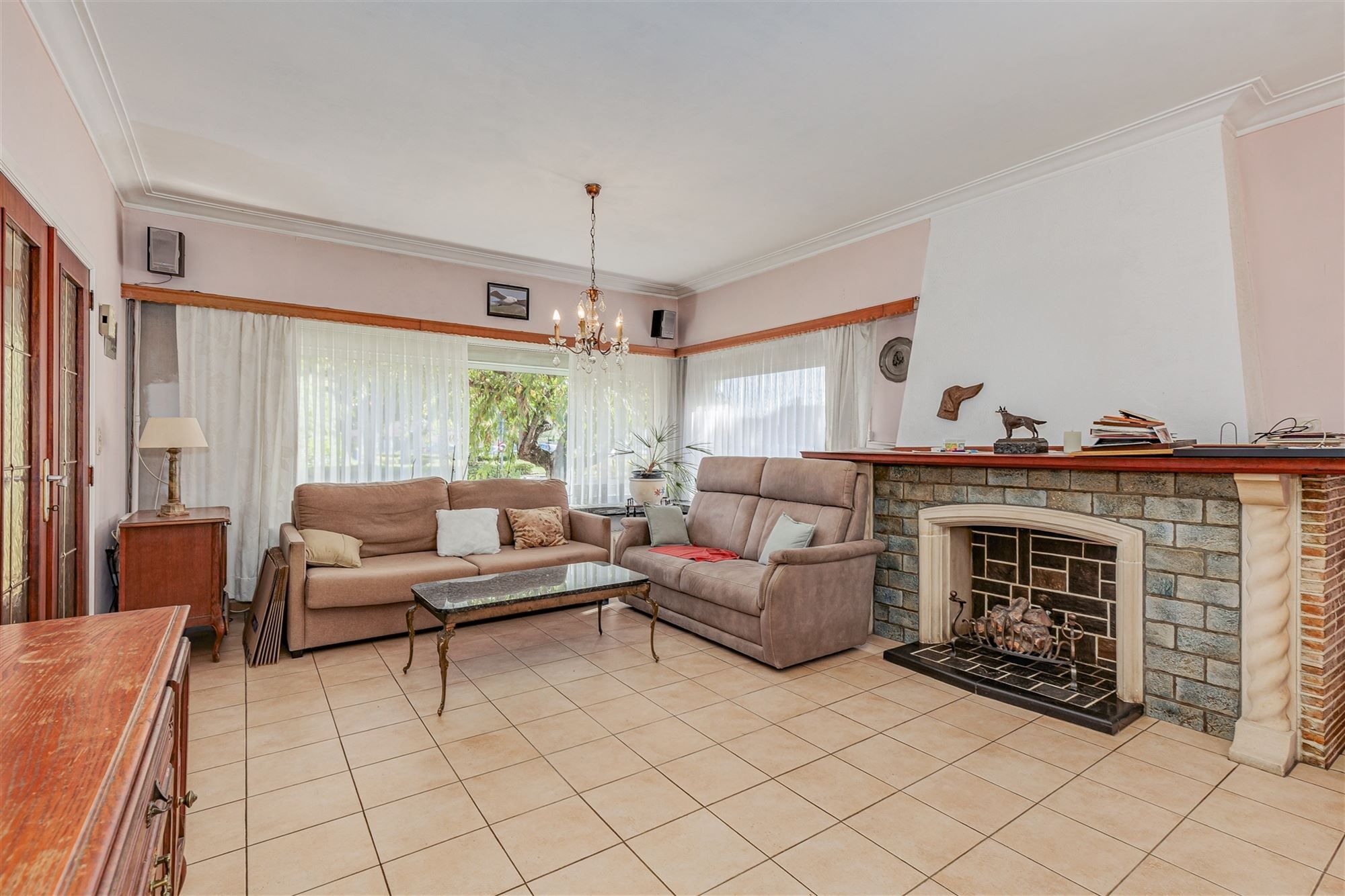 Te renoveren woning met 3 slpk, terras en ruime tuin in Wommelgem! foto 2