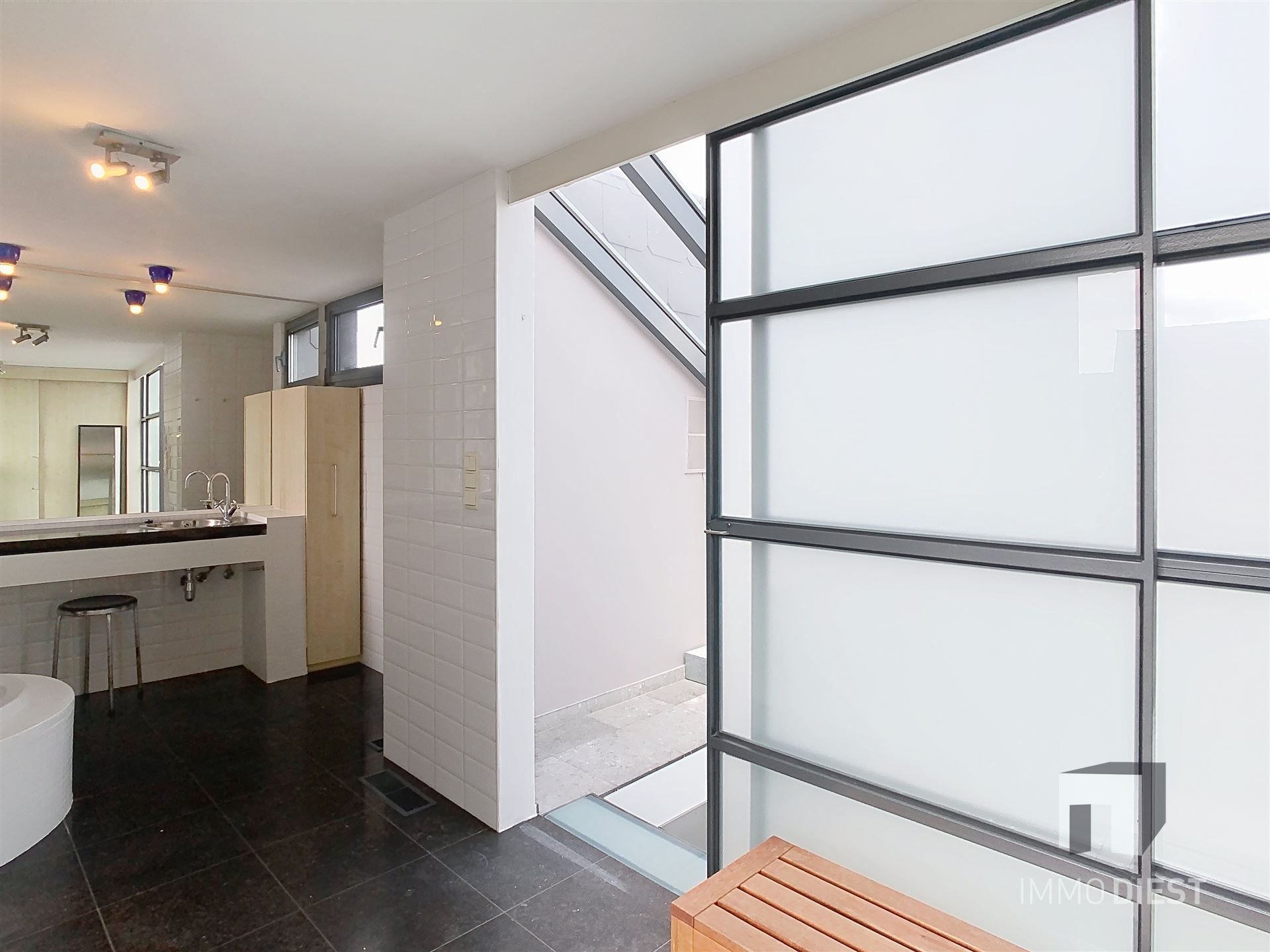 Hippe splitlevel met 3 slaapkamers in hartje Zichem. foto 19