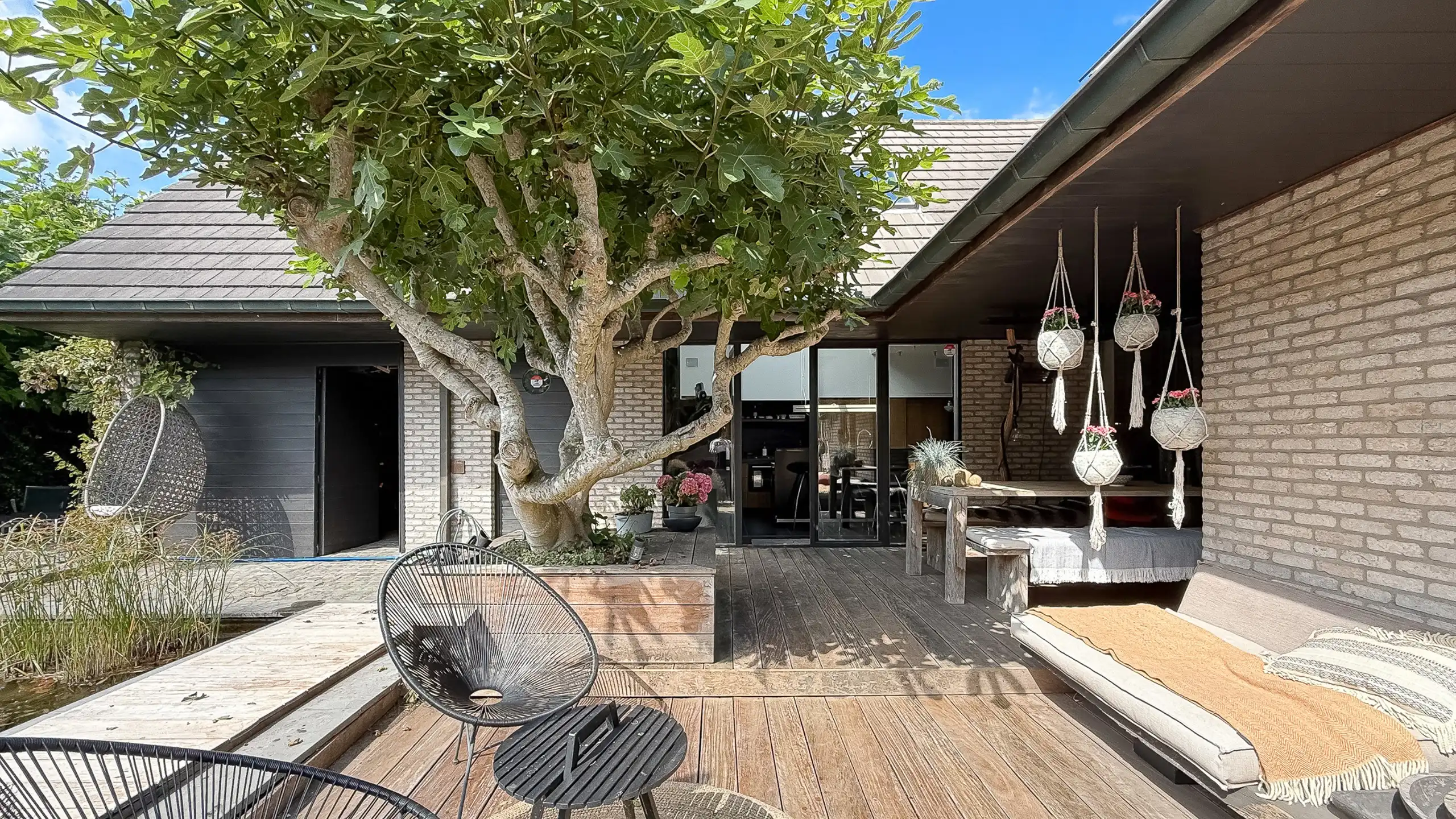 Villa met privé- en praktijkgedeelte – stijlvolle tuin foto 3