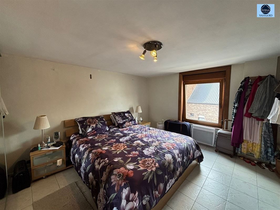 WONING MET 5 SLAAPKAMERS EN STADSTUINTJE. foto 4