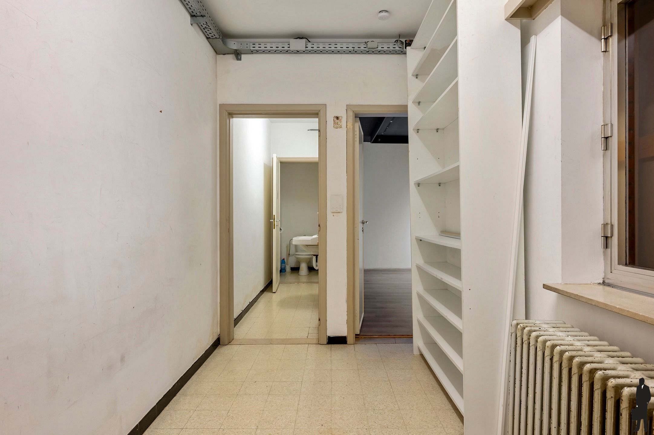 Ruim gelijkvloers handelspand met een oppervlakte van 180m² foto 14