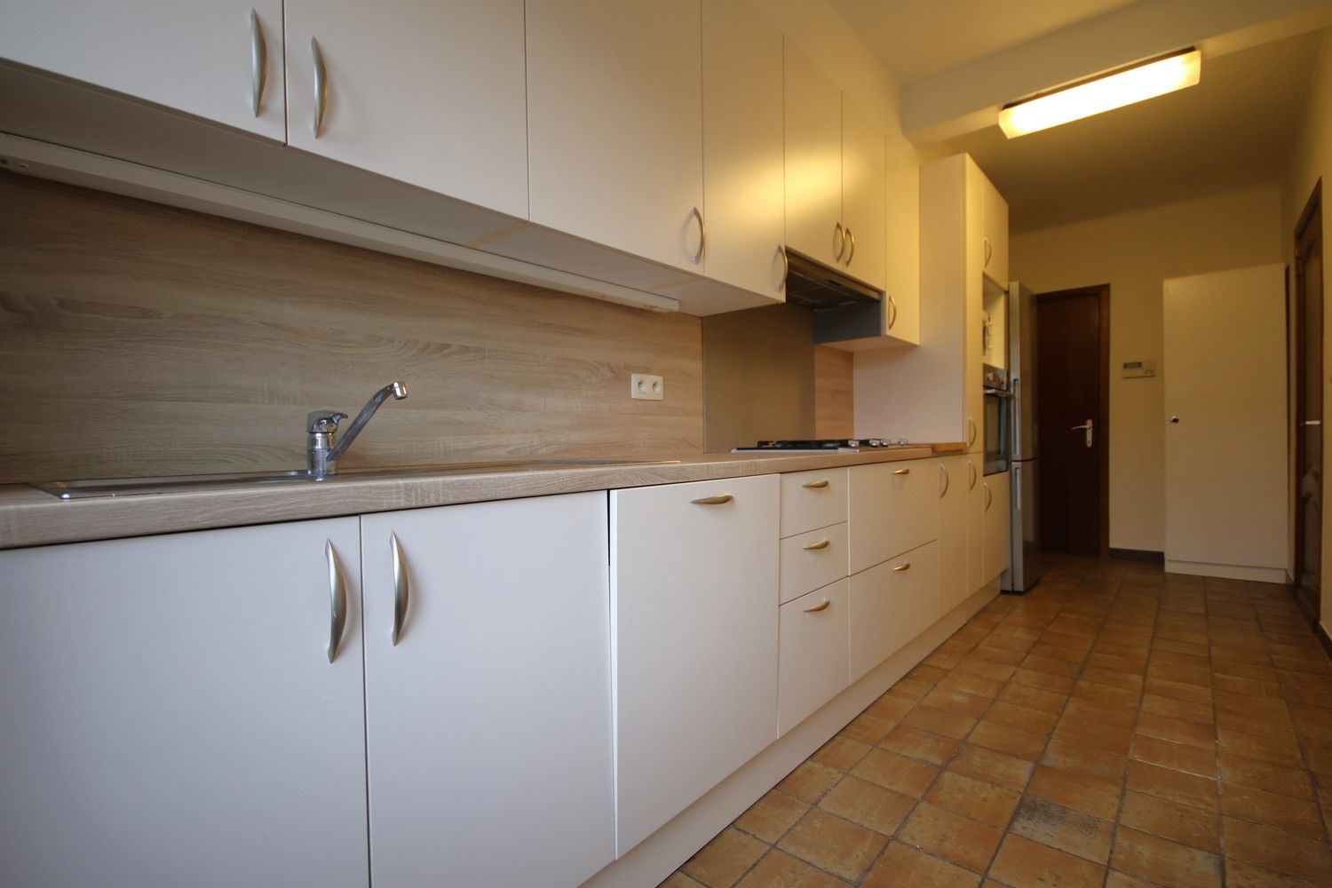 Ruime woning met 3 slaapkamers en tuin midden in het centrum foto 12